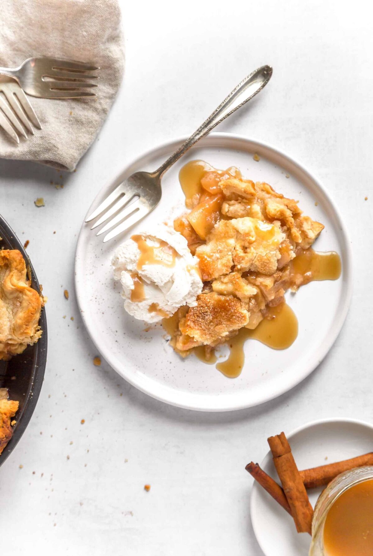A vegan apple pie with dairy-free ice cream.