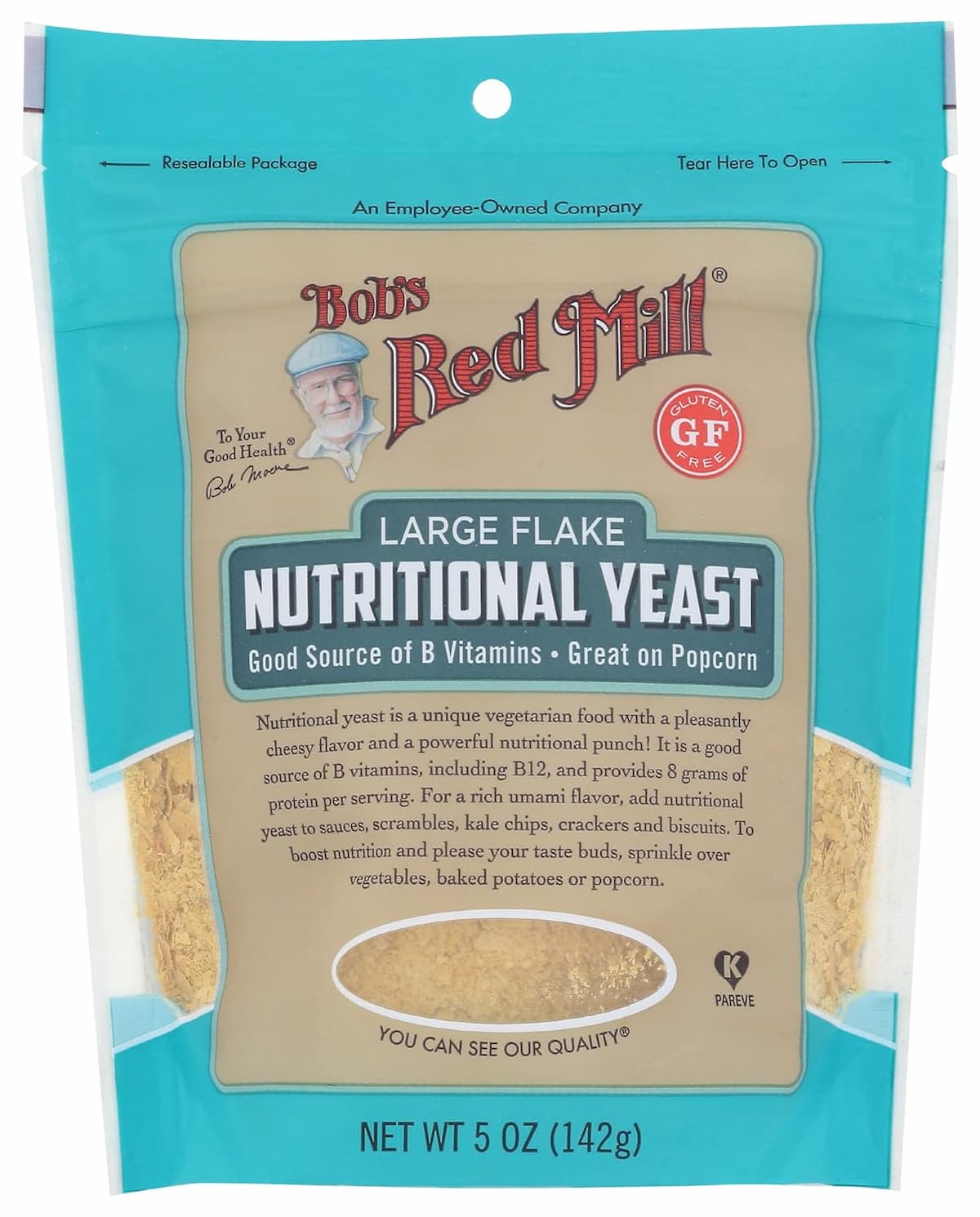 Turquoise bag of Bob's Red Mill Nutritional Yeast on a white background.