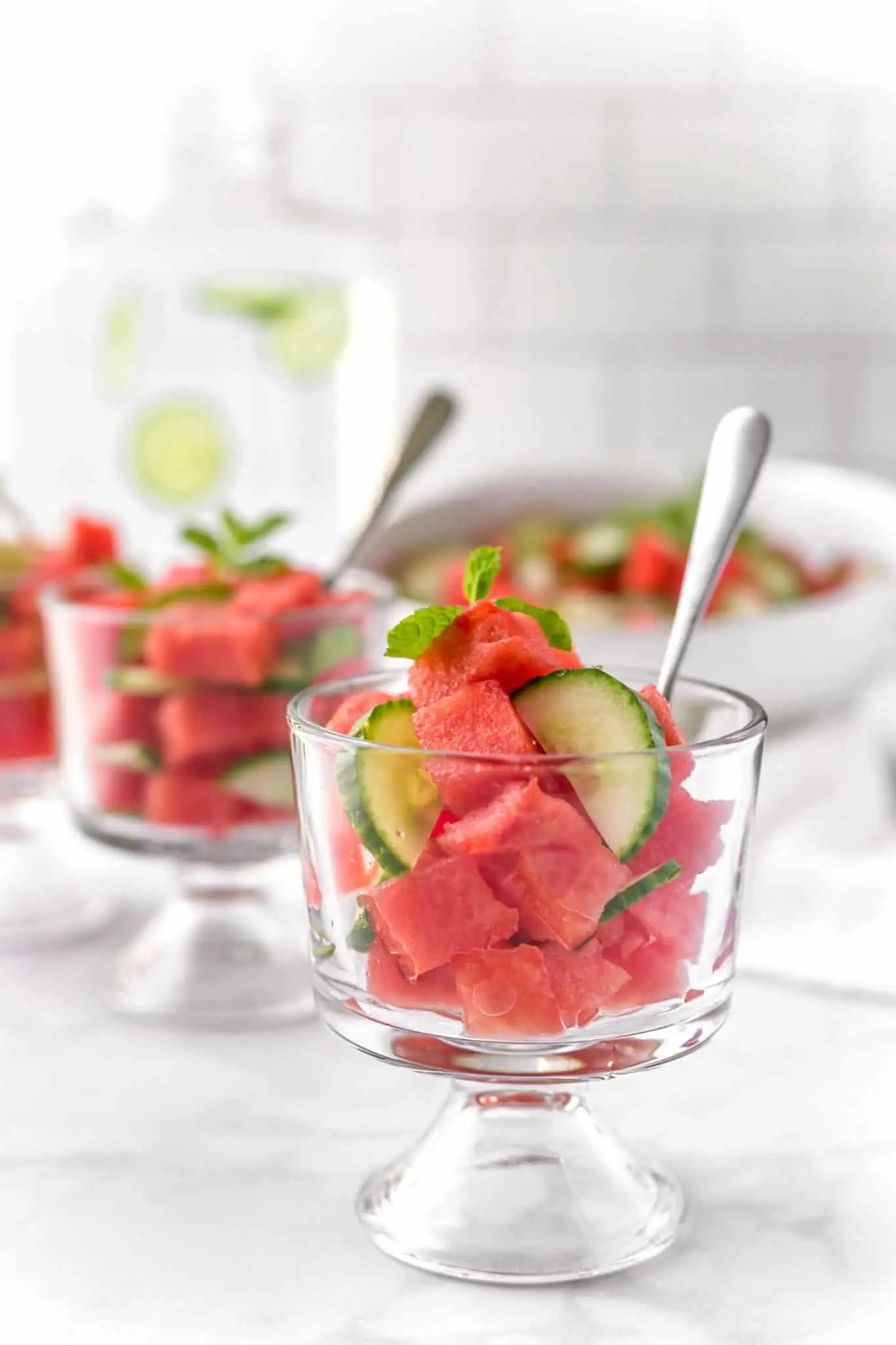 Watermelon Salad with Cucumber, lime, and agave nectar served in party glasses.