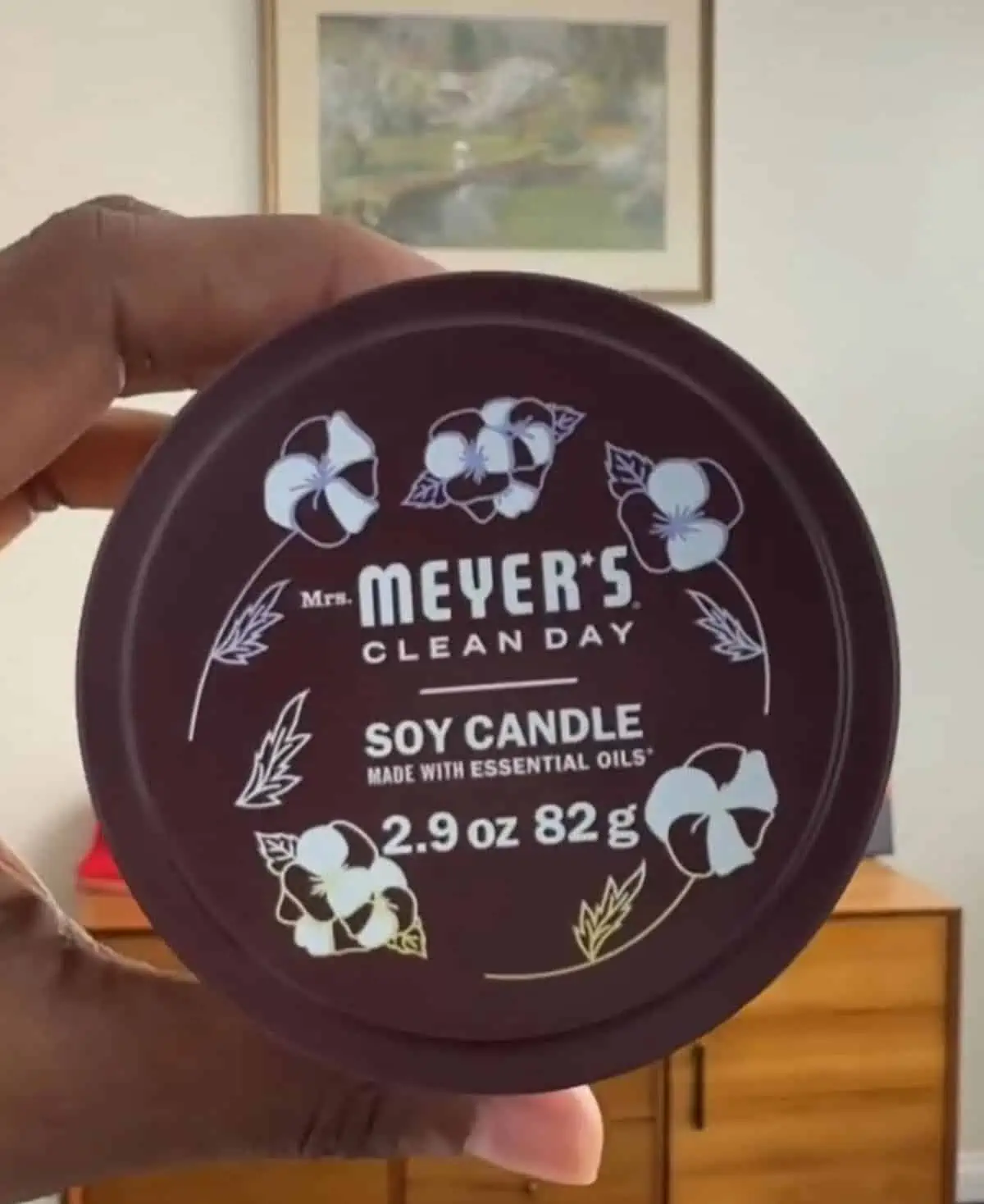 A lid from a Mrs. Meyer's brand soy candle.