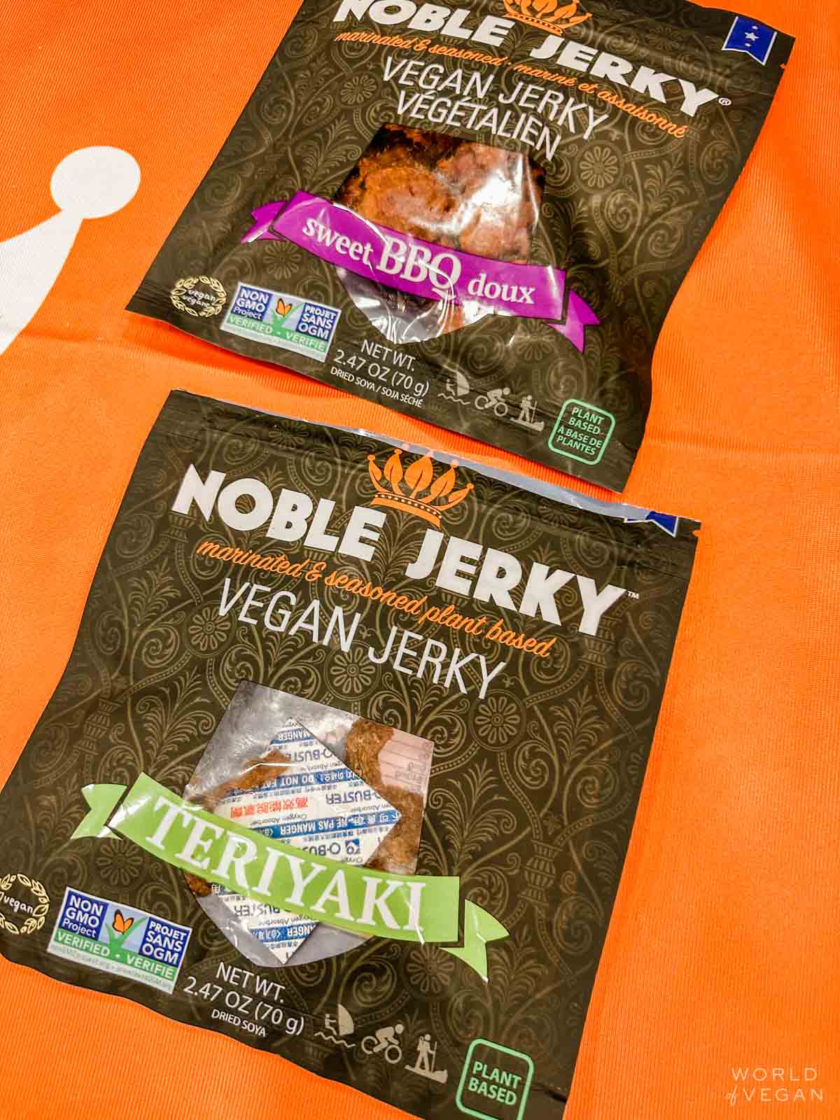 Two packages of Noble Jerky brand vegan jerky in Sweet BBQ and Teriyaki.