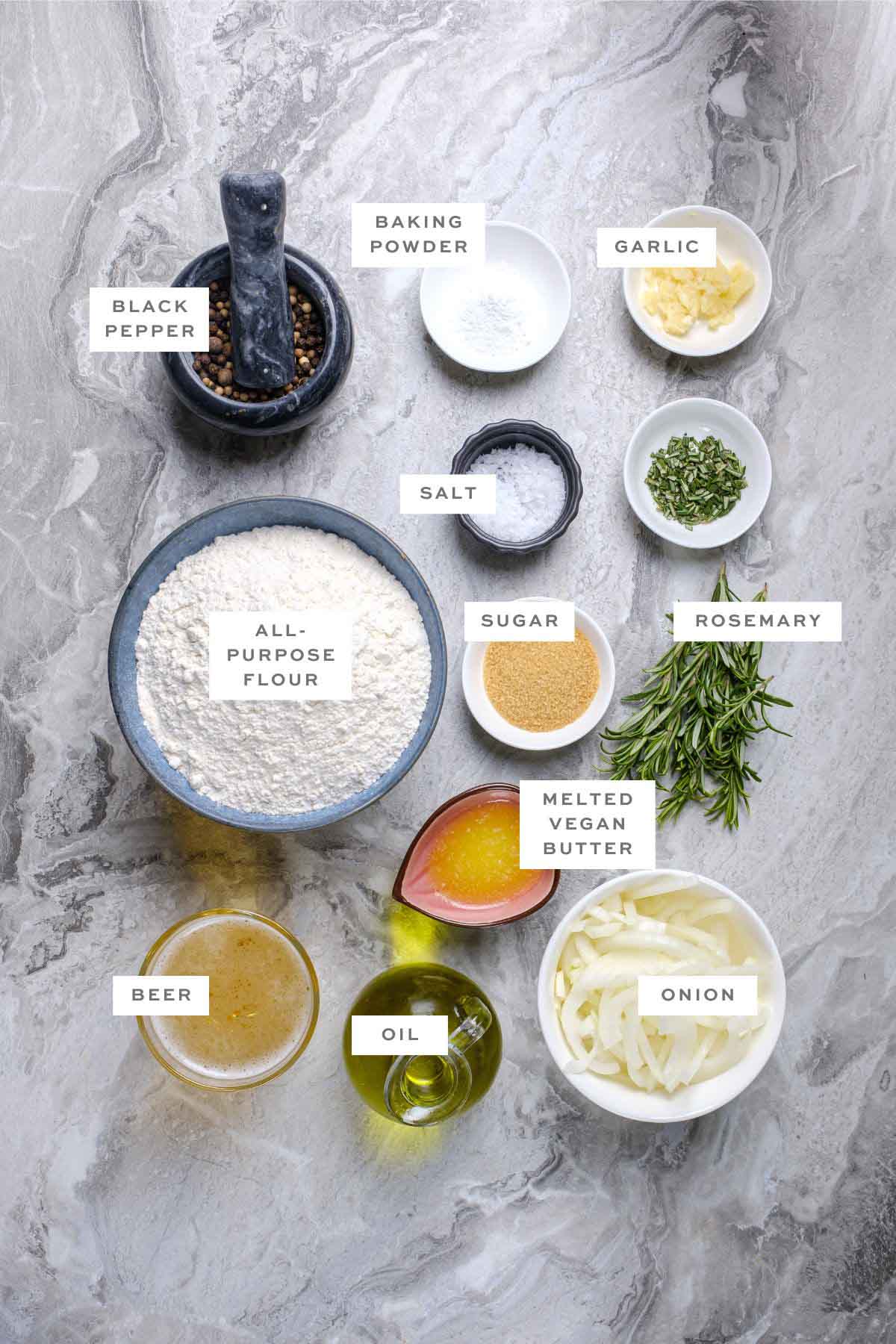 Ingredients for rosemary beer bread, with labels.