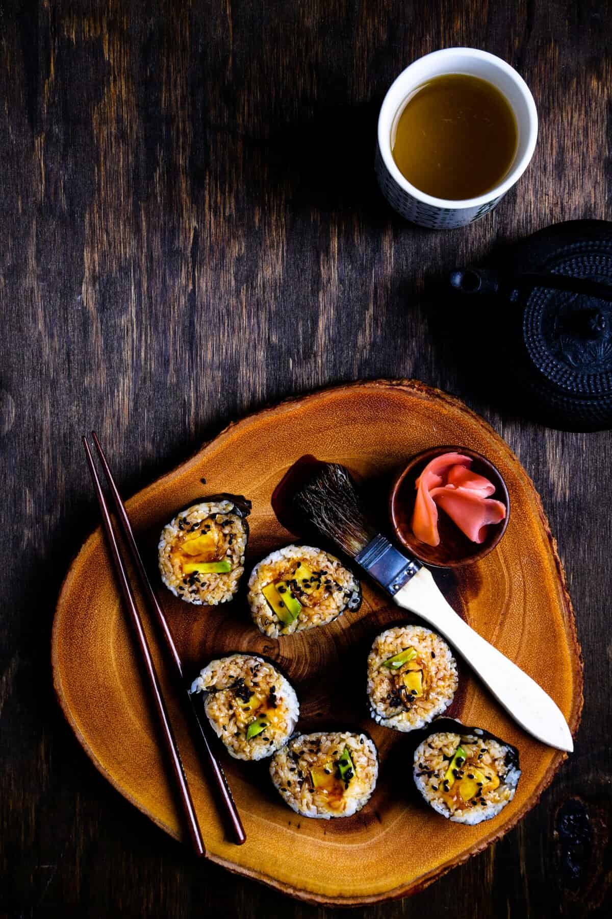 Sweet potato tempura sushi rolls with teriyaki glaze.