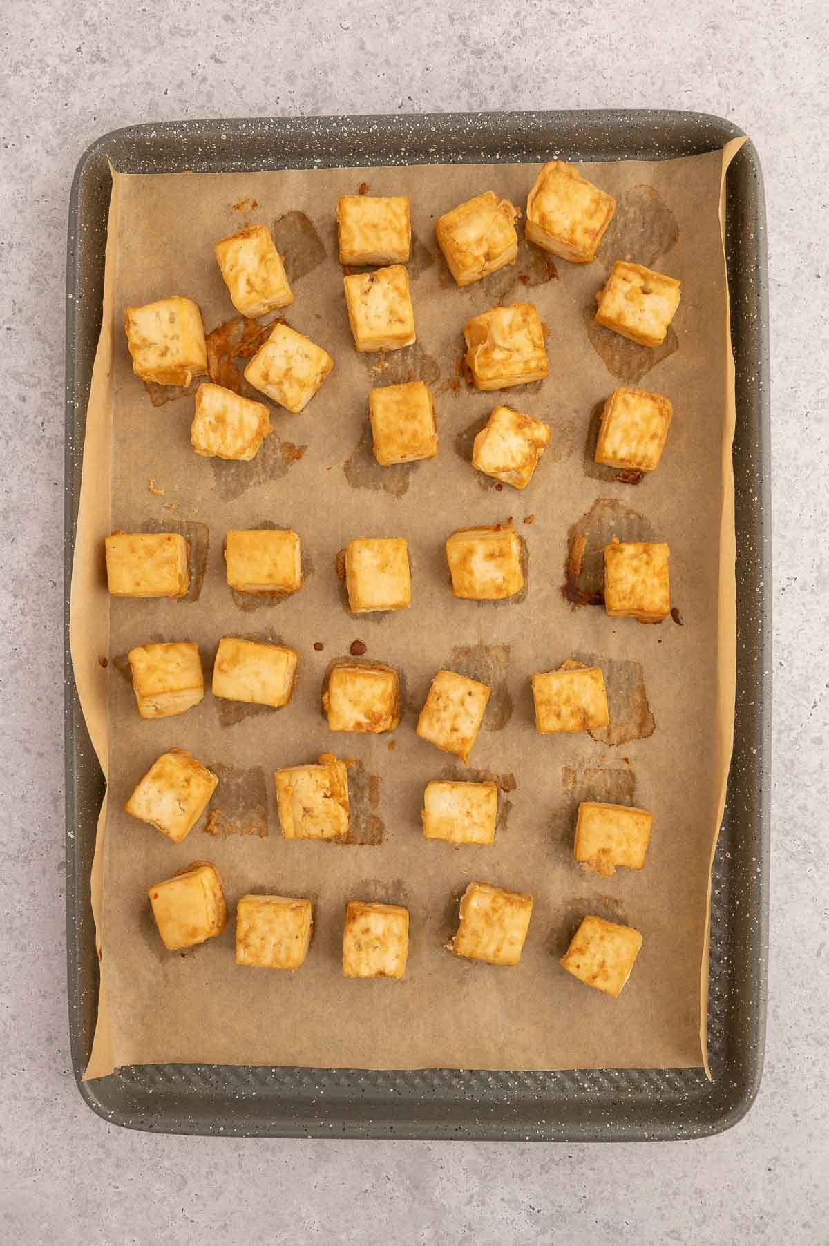 Cubed tofu pieces after baking for this Thai tofu salad recipe.
