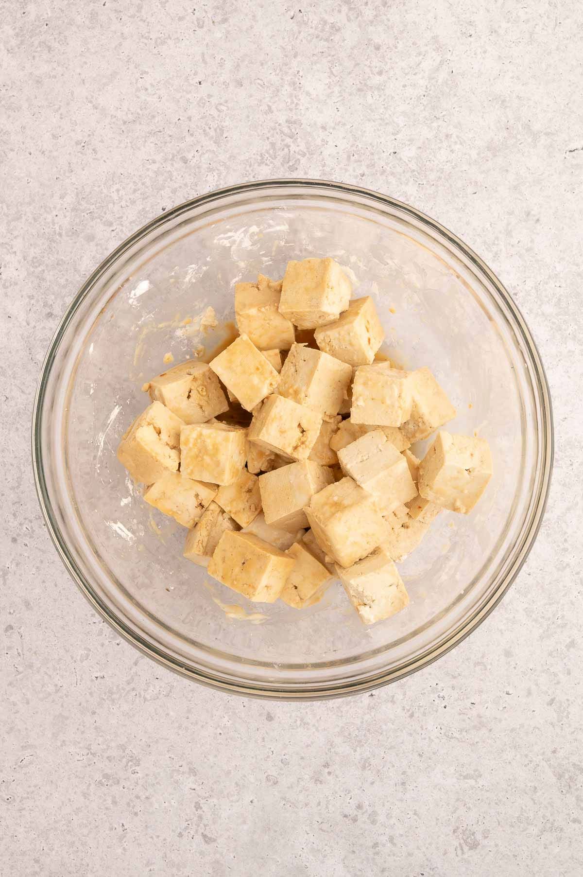 Tofu cubes for this Thai peanut salad after mixing.