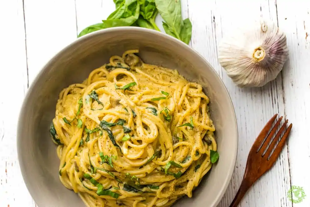 garlicky one pot pasta that tastes like a creamy plant based spaghetti with a dairy free cream sauce