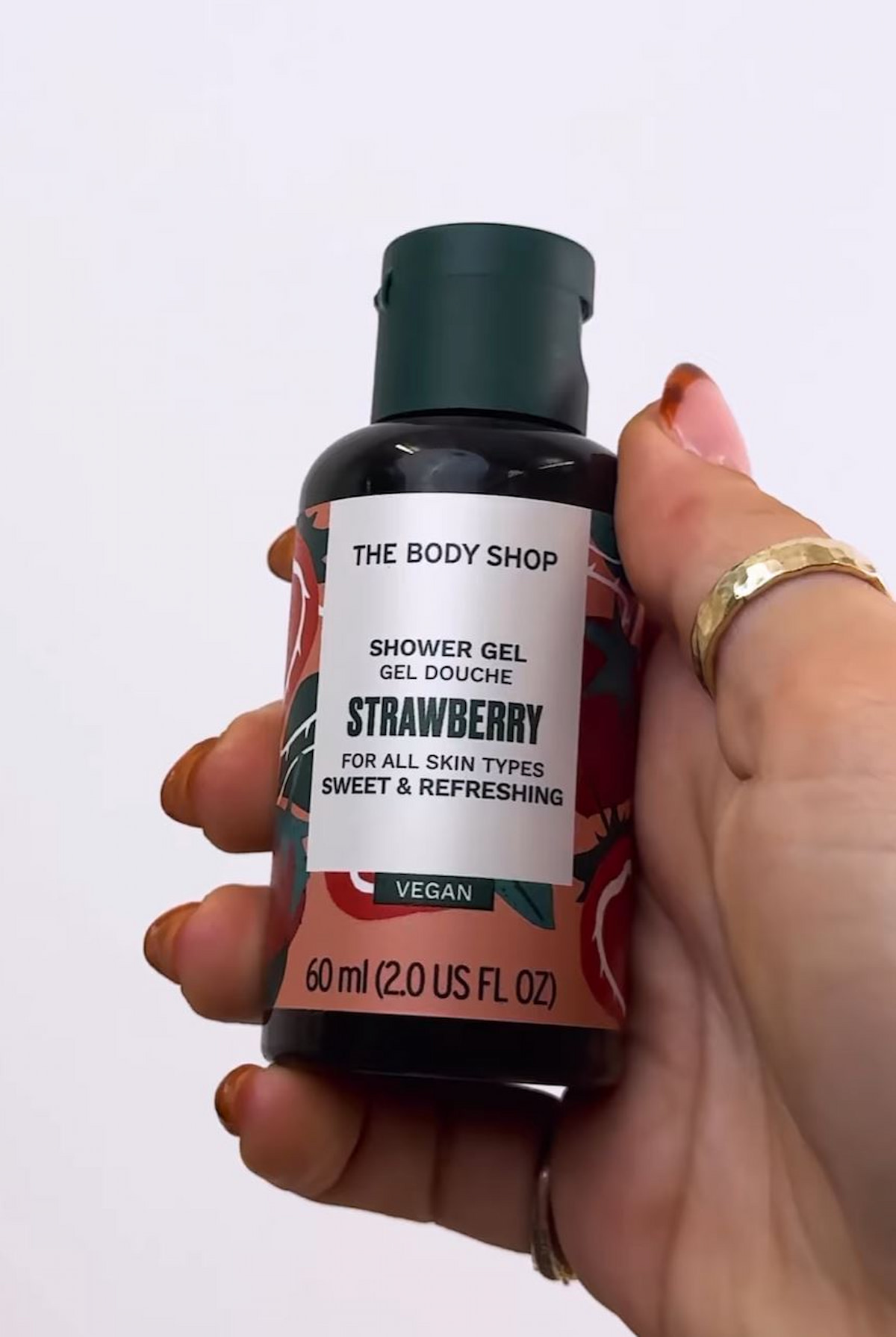 A bottle of vegan body wash by The Body Shop.