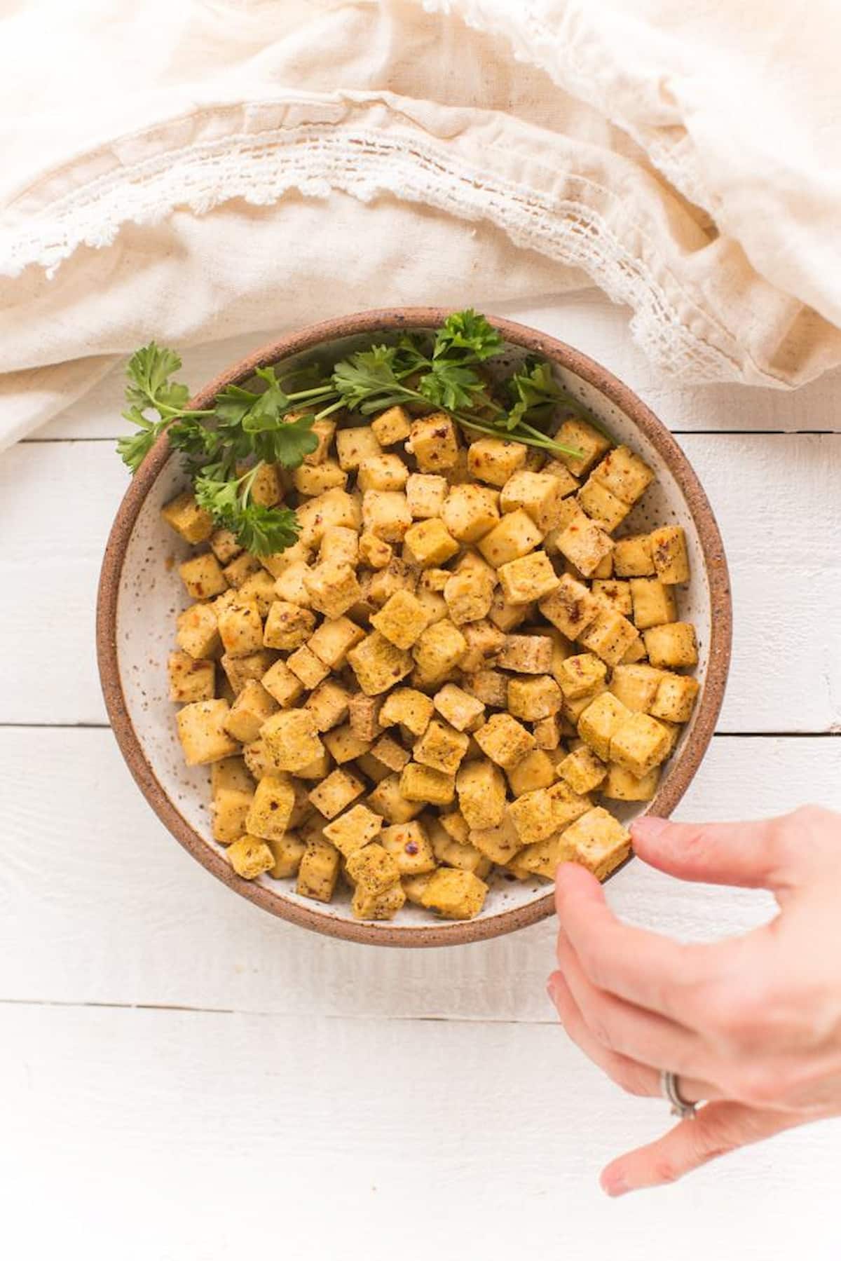 A bowl of air-fried tofu nuggets.