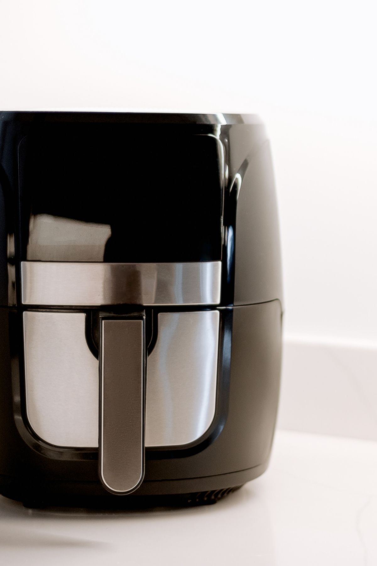 An air fryer on a counter top.