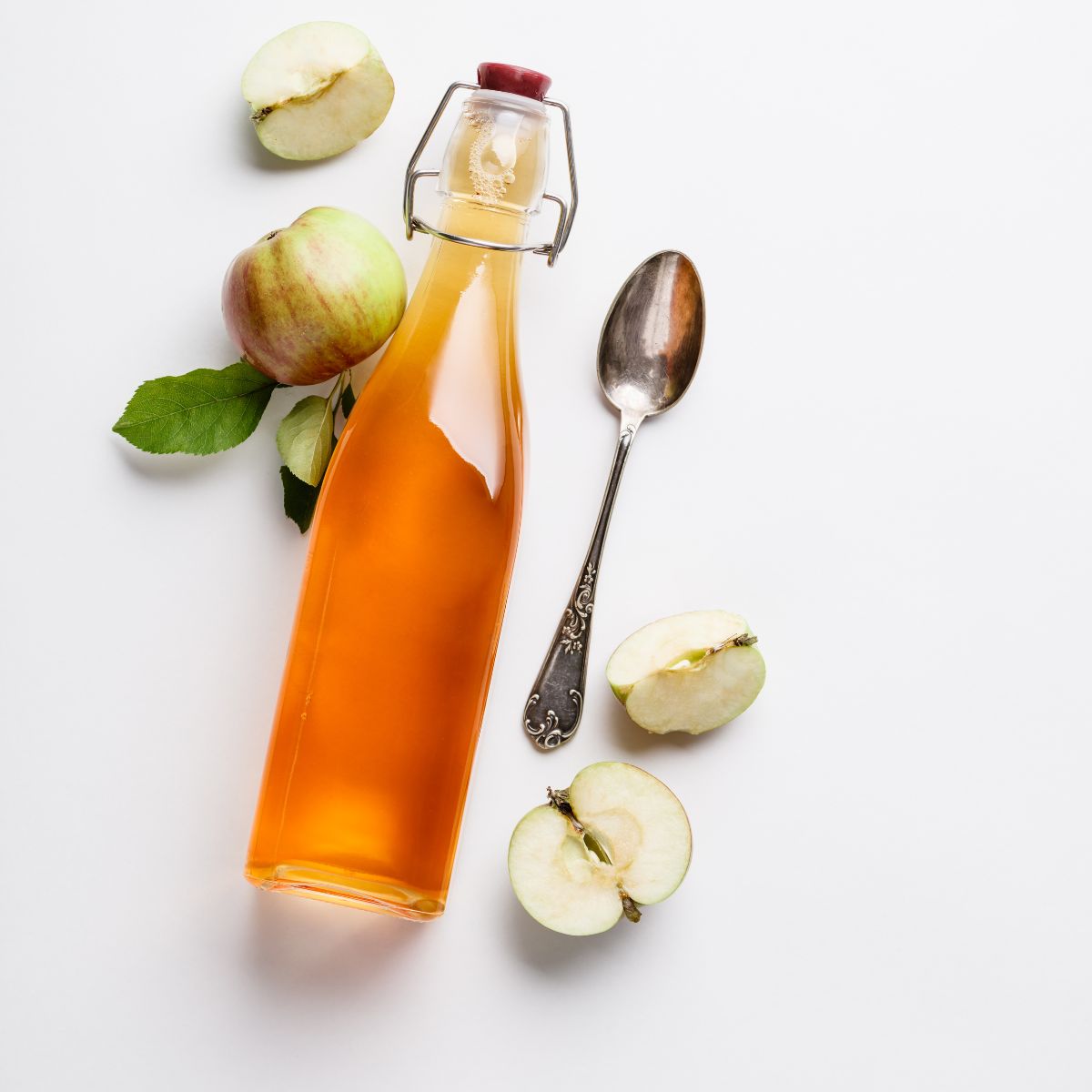 A bottle of apple cider vinegar, one of the most versatile vegan pantry essentials.