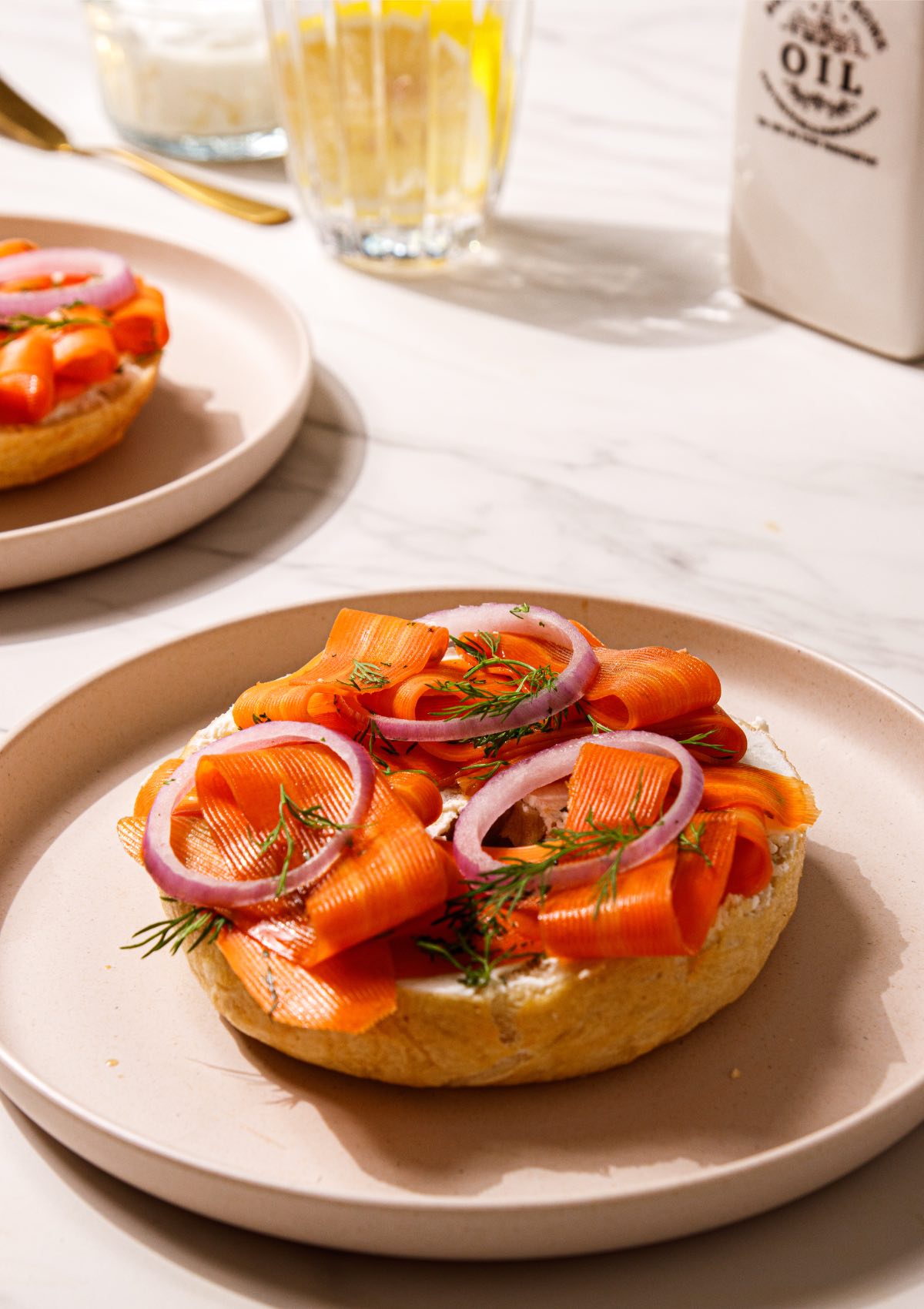 Carrot lox with cream cheese, capers, and onion, a great recipe for vegan Passover when served on matzah.