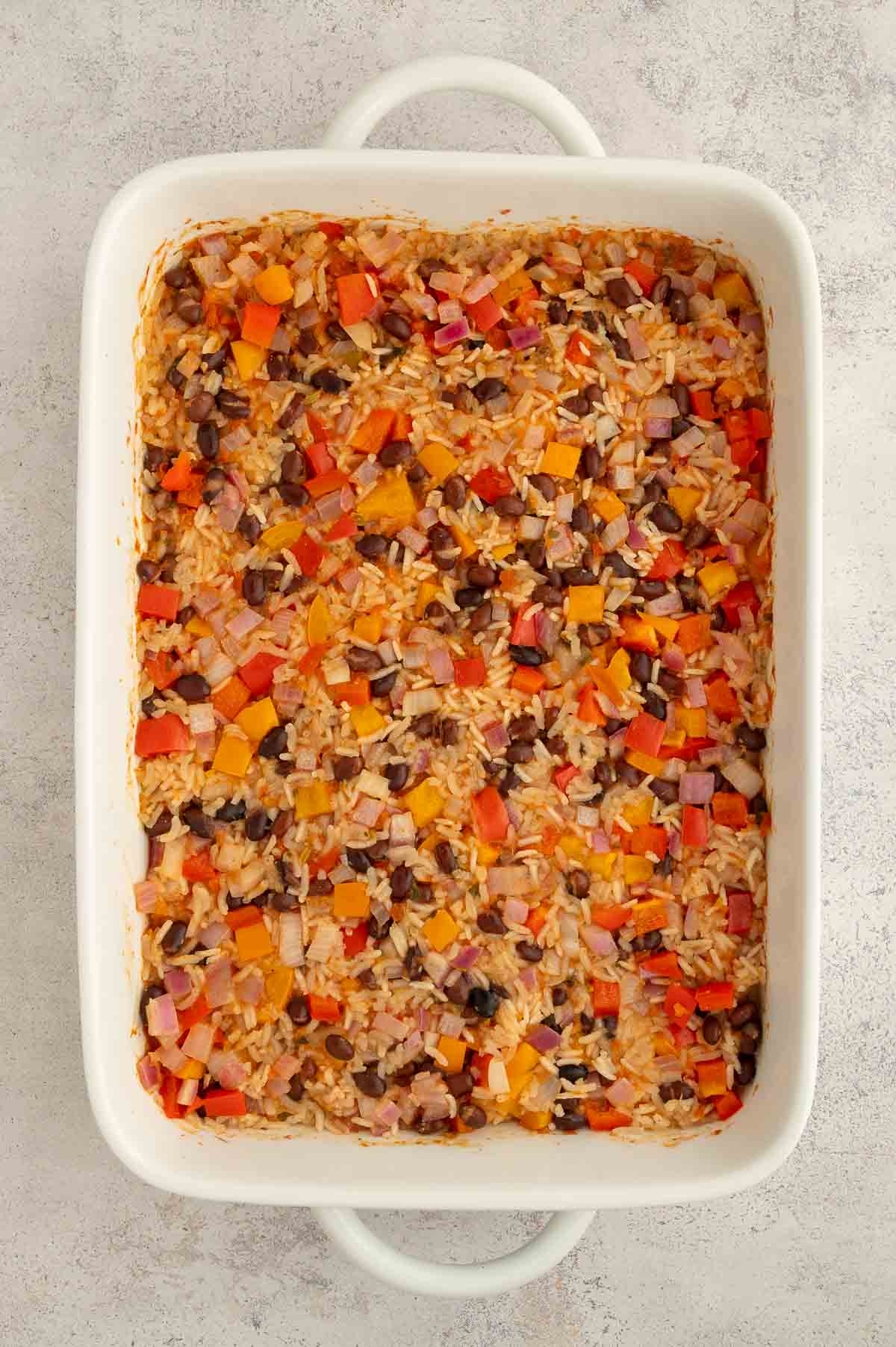 The bean and rice casserole after baking for 45-50 minutes before toppings are added.