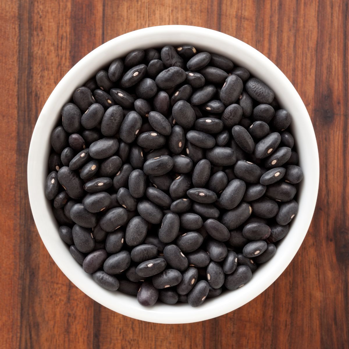 A bowl of black beans.