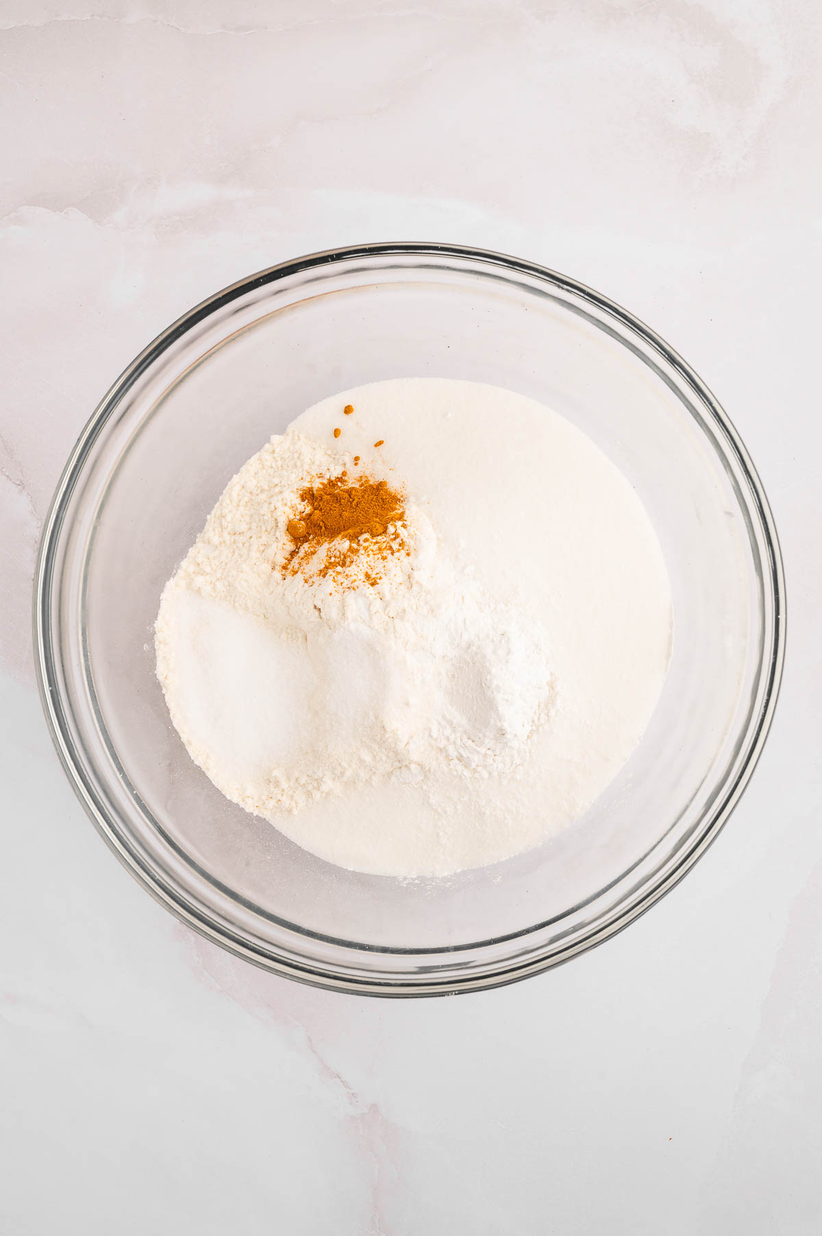 Flour and spices in a mixing bowl.