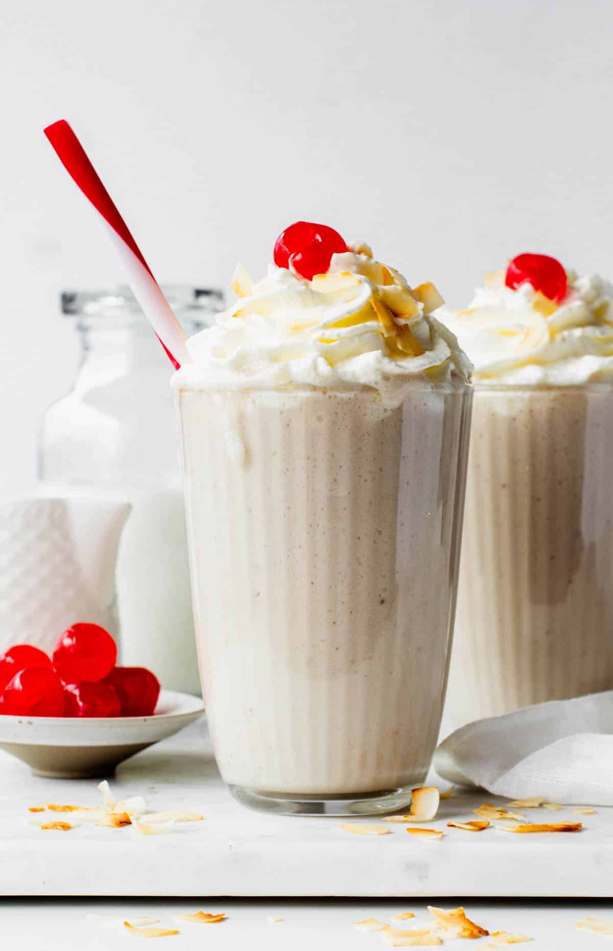 A vegan coconut shake with dairy-free whipped cream.