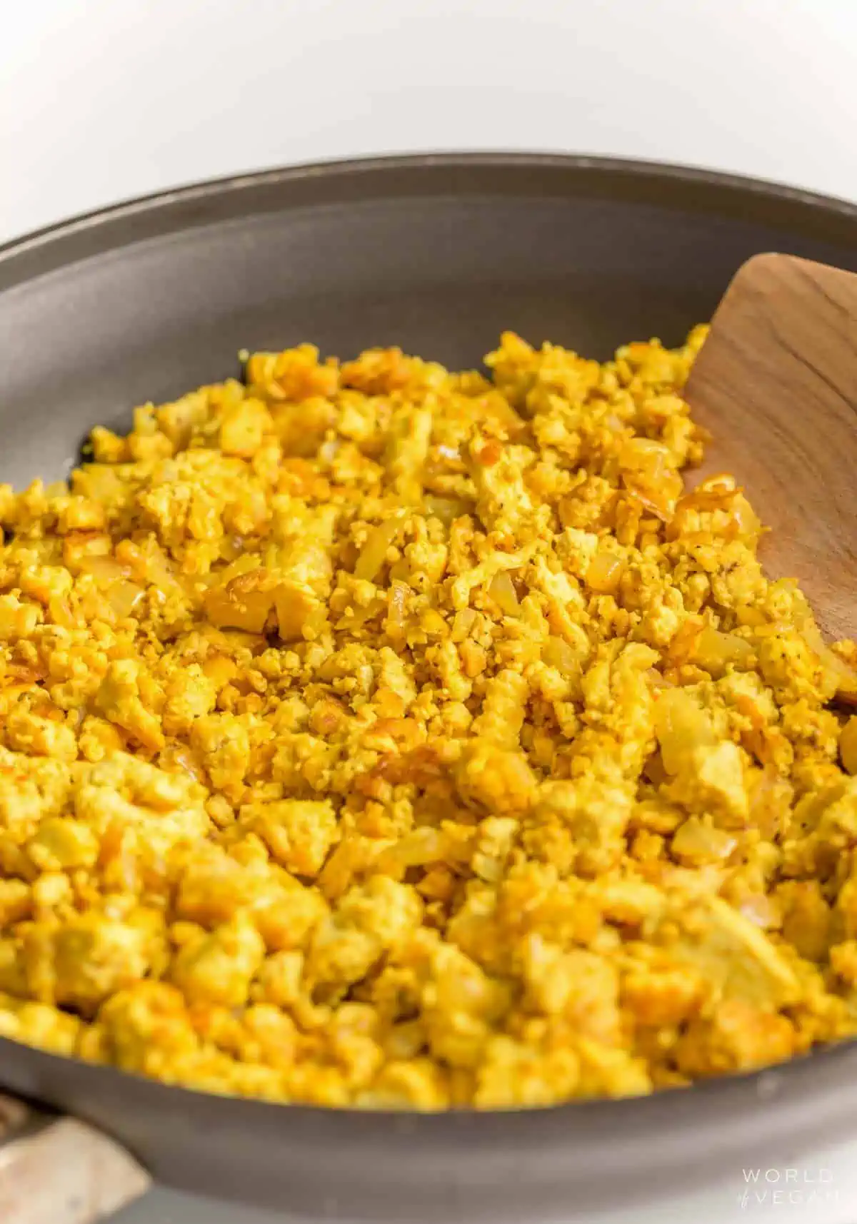 cooking tofu scramble in a frying pan