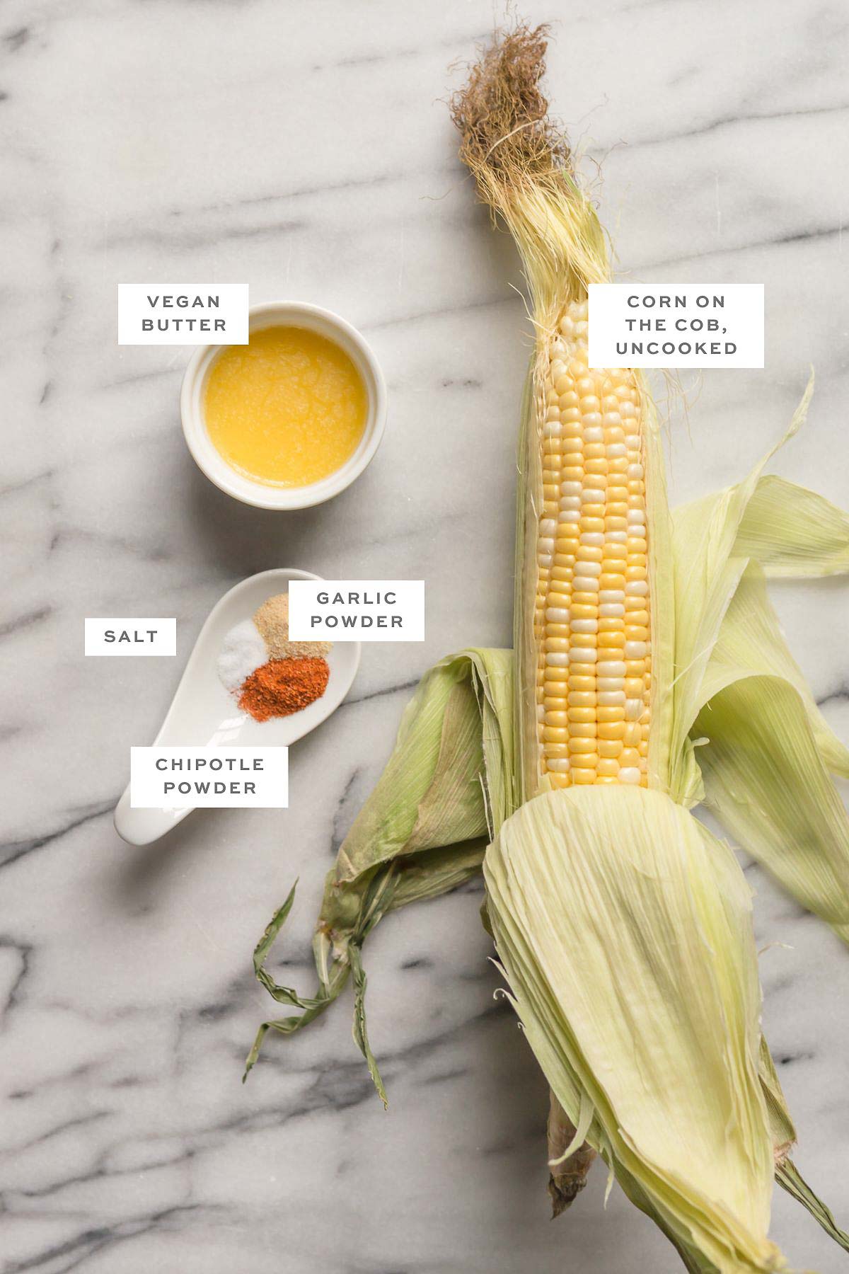Ingredients for corn ribs with labels.