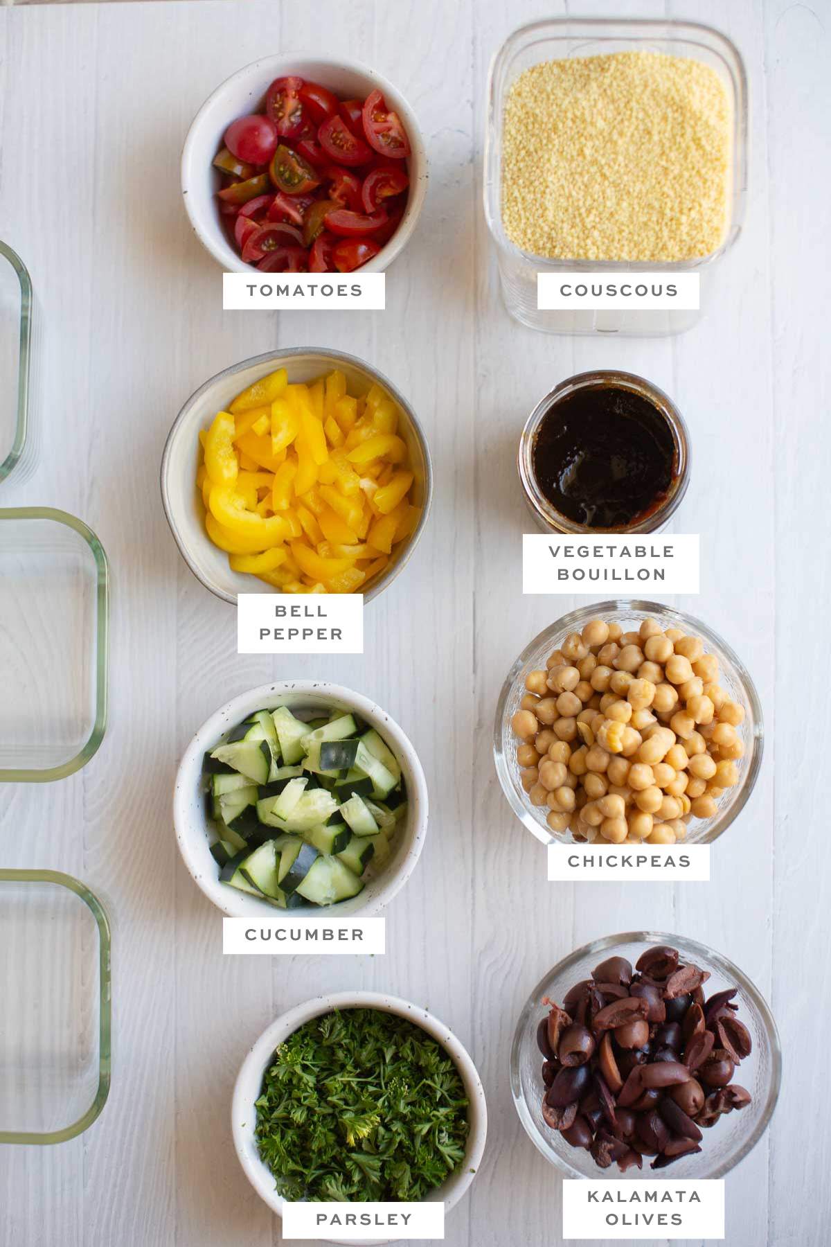Ingredients for these couscous bowls measured out into individual bowls with labels.
