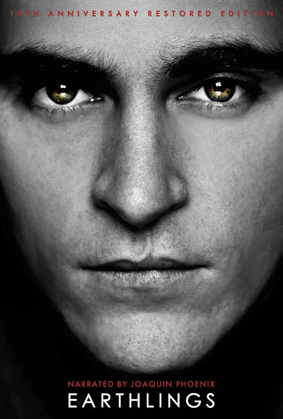 Movie poster for Earthlings documentary narrated by Joaquin Phoenix about animal exploitation.