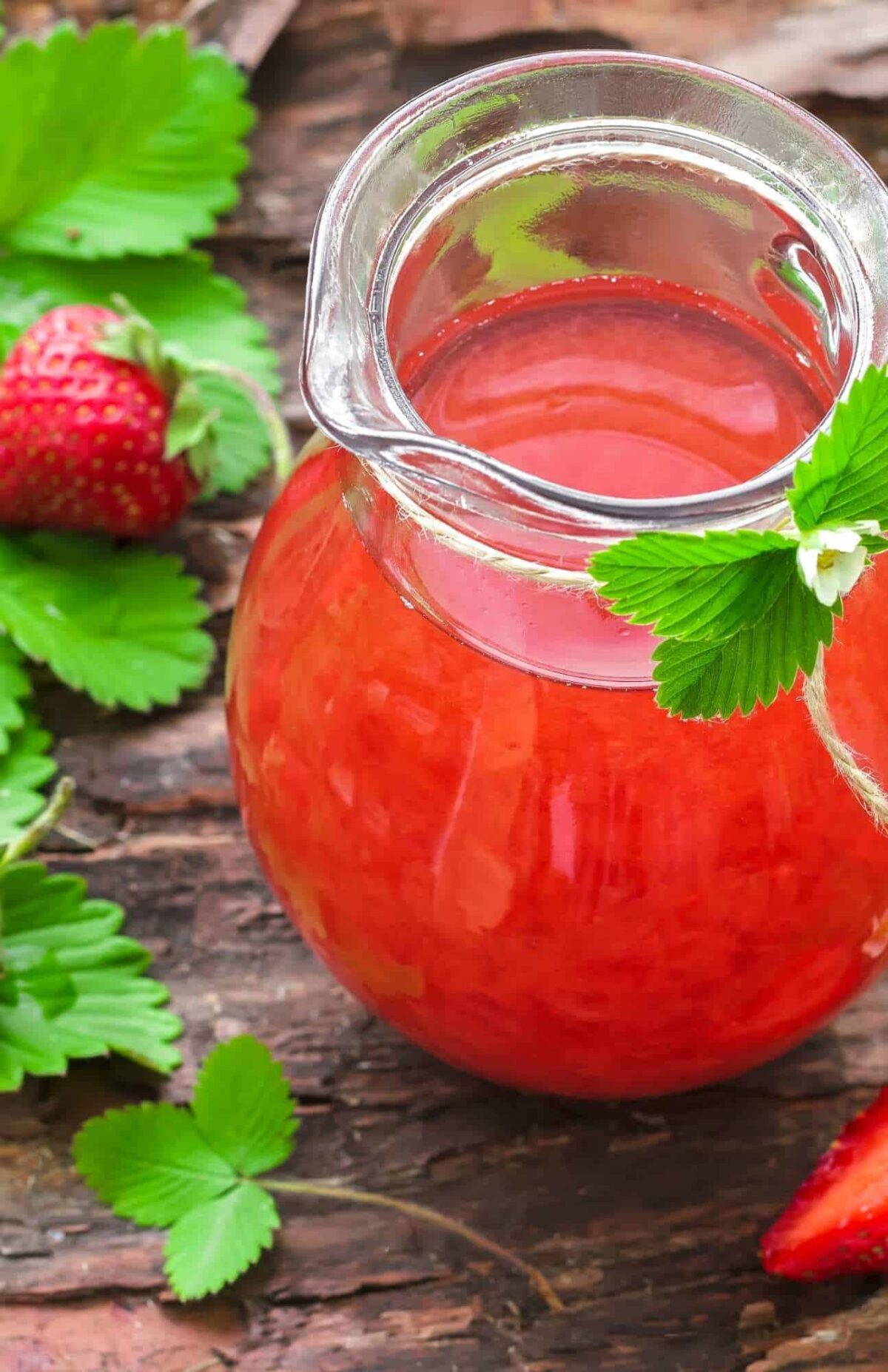 Easy homemade strawberry juice in a glass pitcher—fresh, fruity, and perfect for vegan summer BBQs.