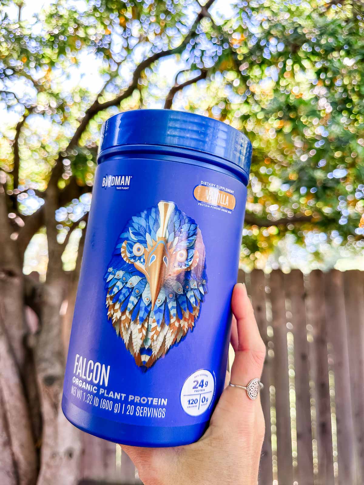A canister of Birdman brand Falcon plant-based protein powder.