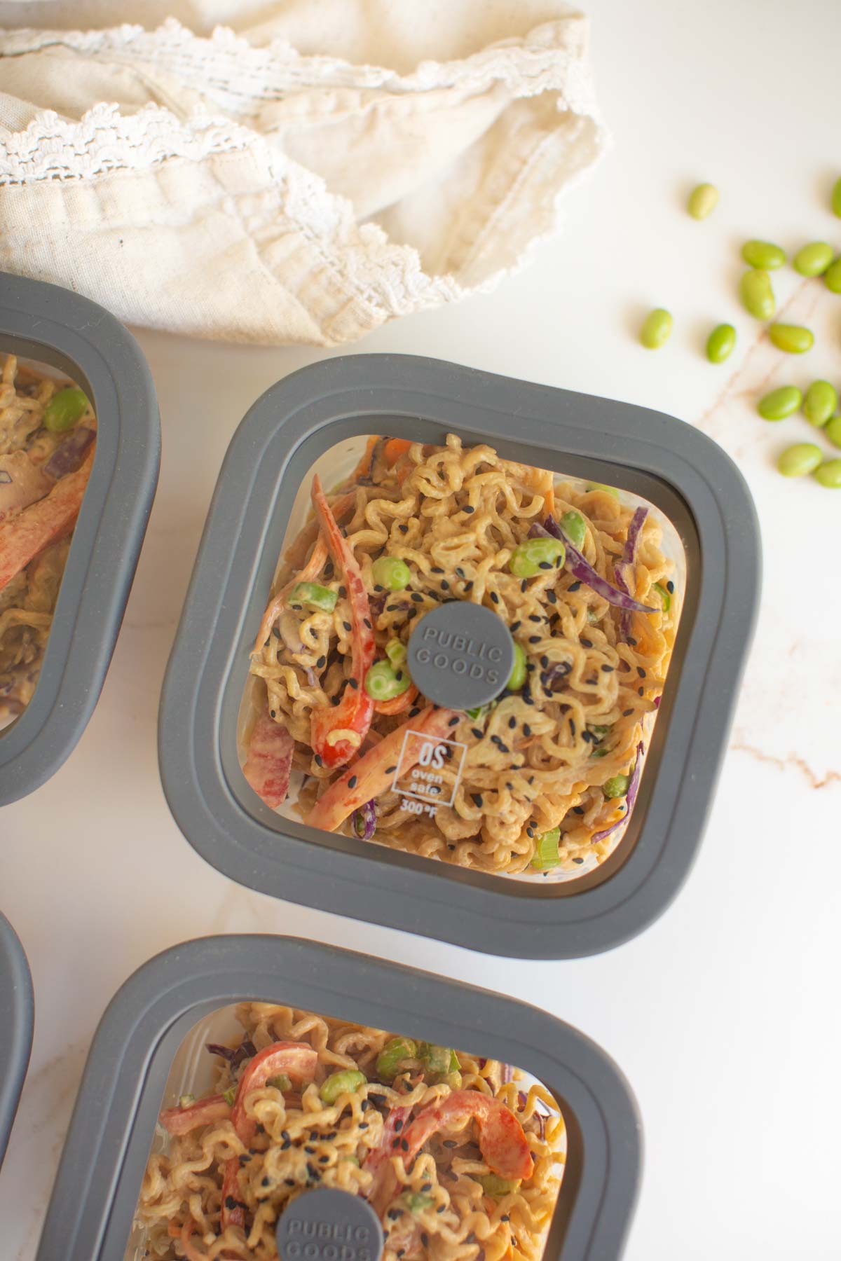 Containers of the peanut butter ramen recipe packed for lunch.