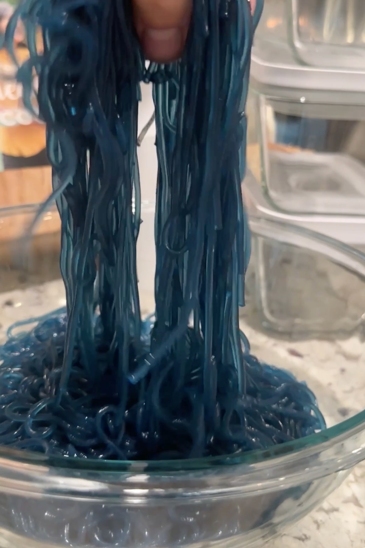 Blue glass noodles that were cooked with butterfly pea flower powder.