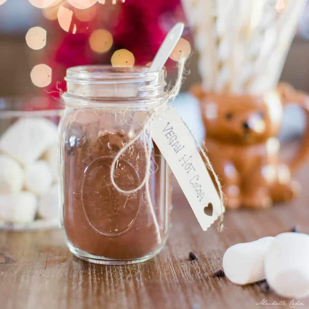 A jar of vegan homemade hot cocoa mix.