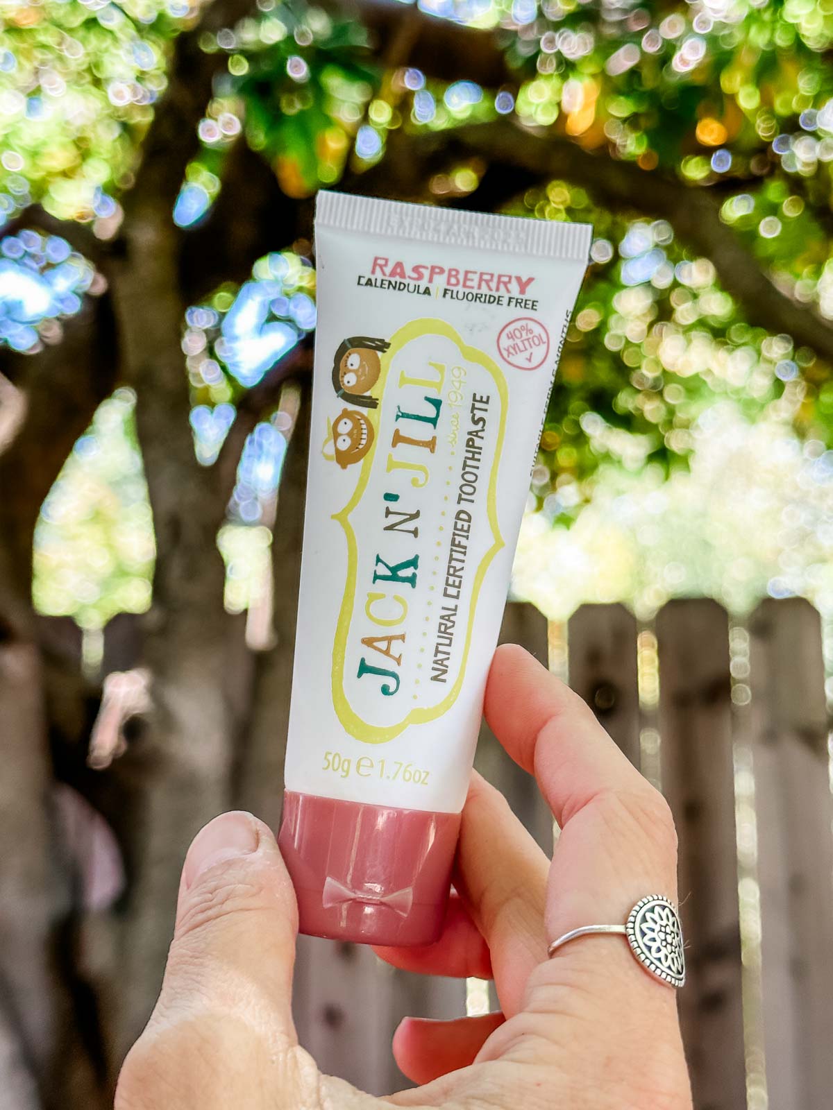 A tube of Jack N Jill brand vegan toothpaste.