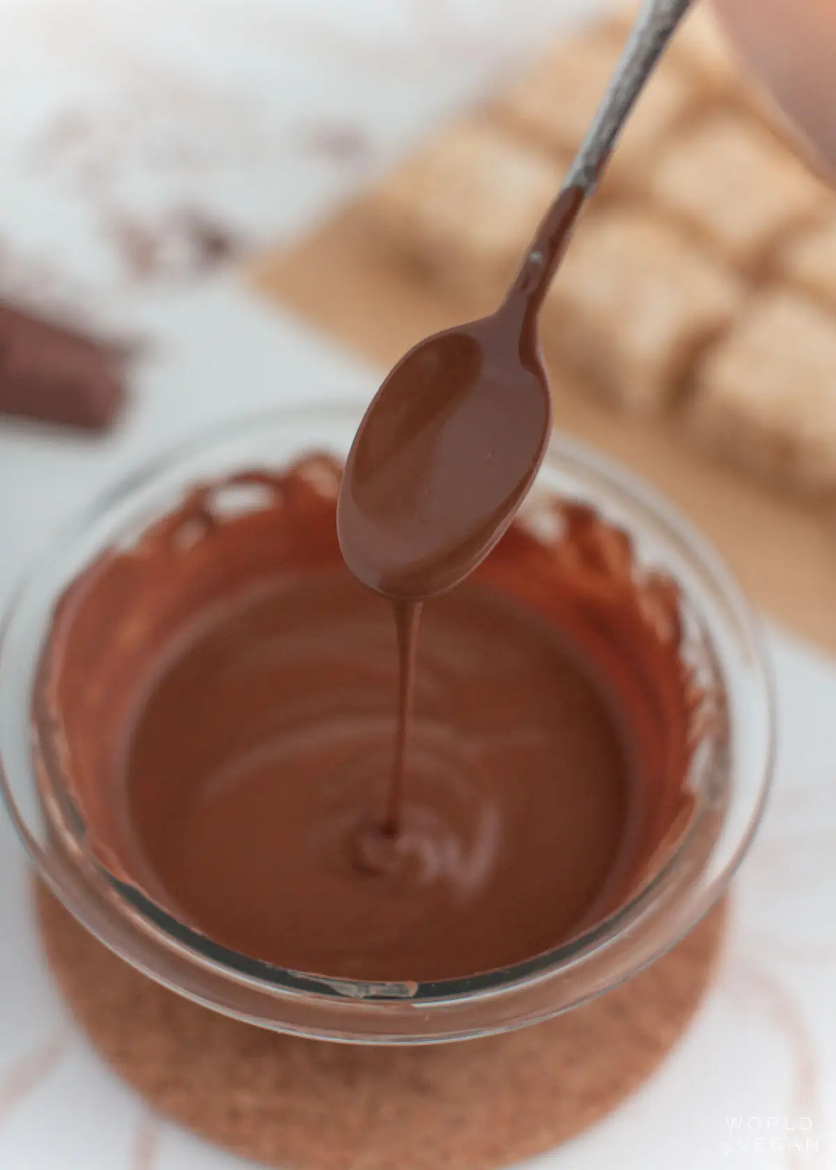 A bowl of melted vegan dairy-free chocolate.
