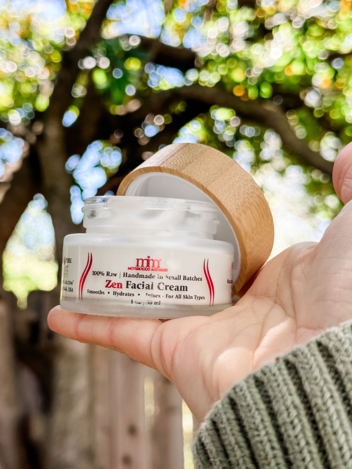 Creamy vegan face cream from Morrocco Method in a glass container.