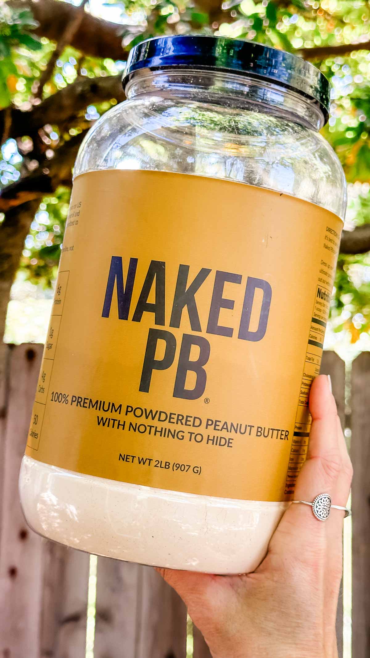 A jar of Naked PB brand powdered peanut butter.