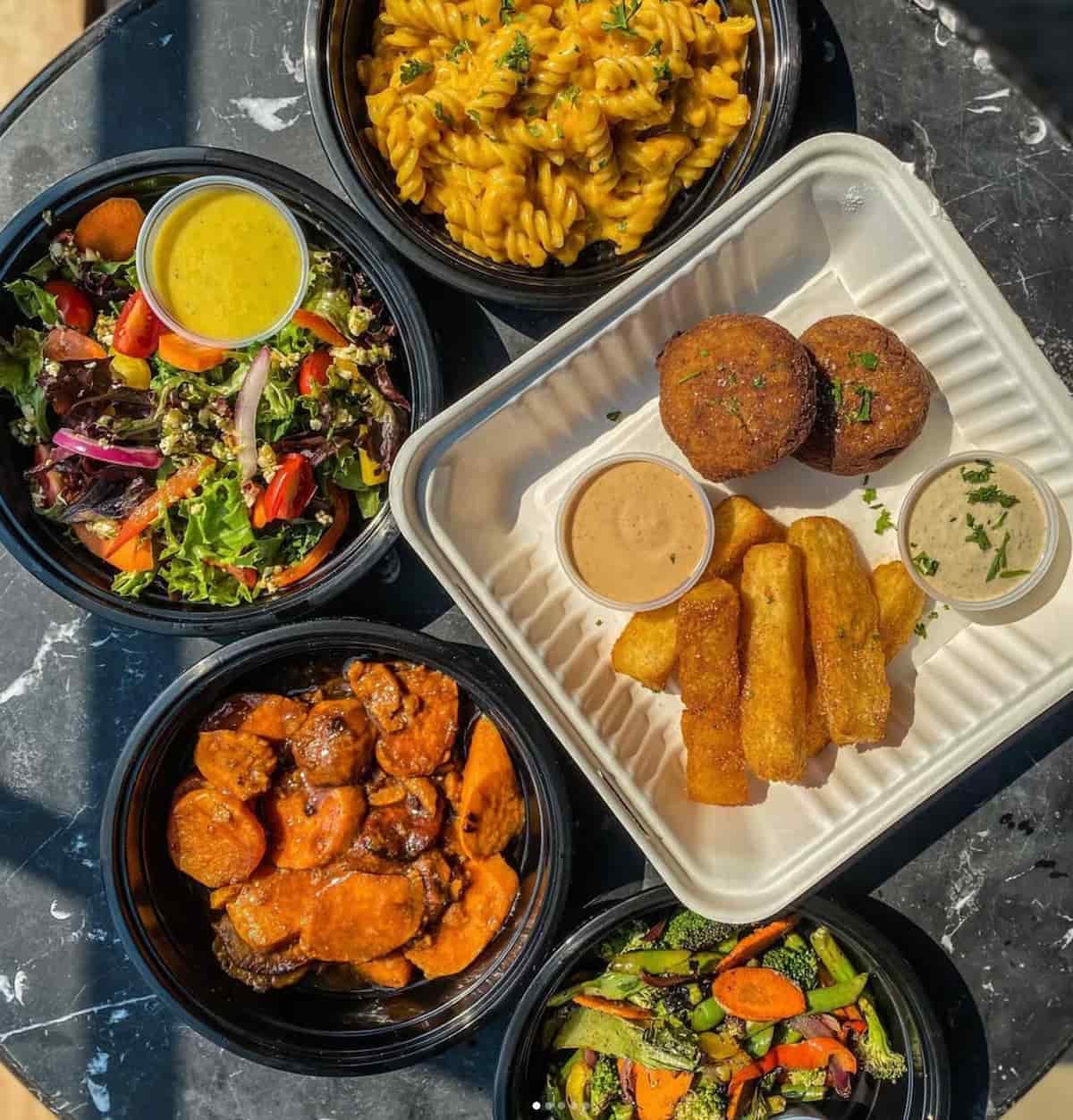 Falafel, yucca fries, and vegan mac and cheese from Roasted and Raw restaurant in Oakland.