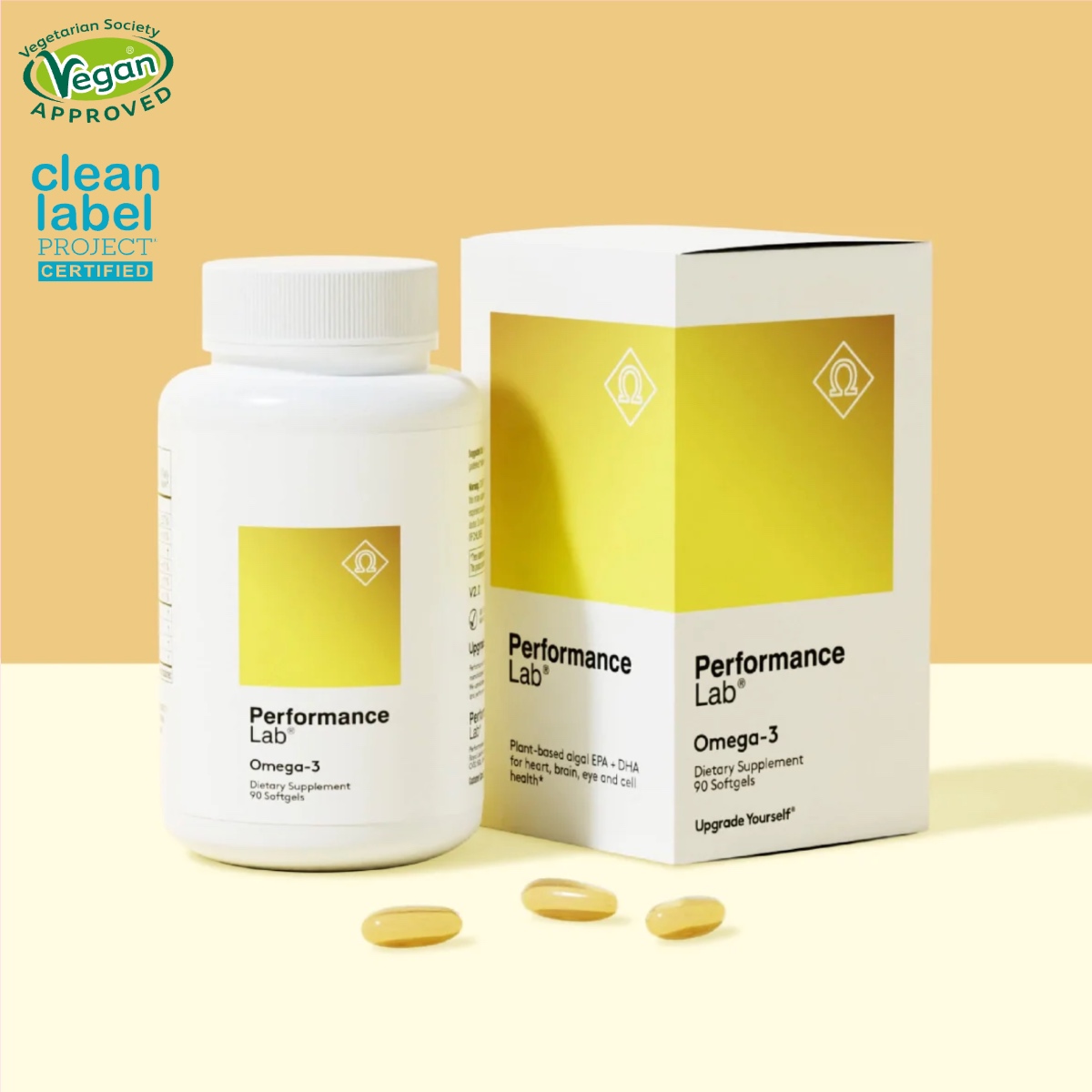 Yellow bottle of Performance Lab Omega-3 supplements on a pale studio background.