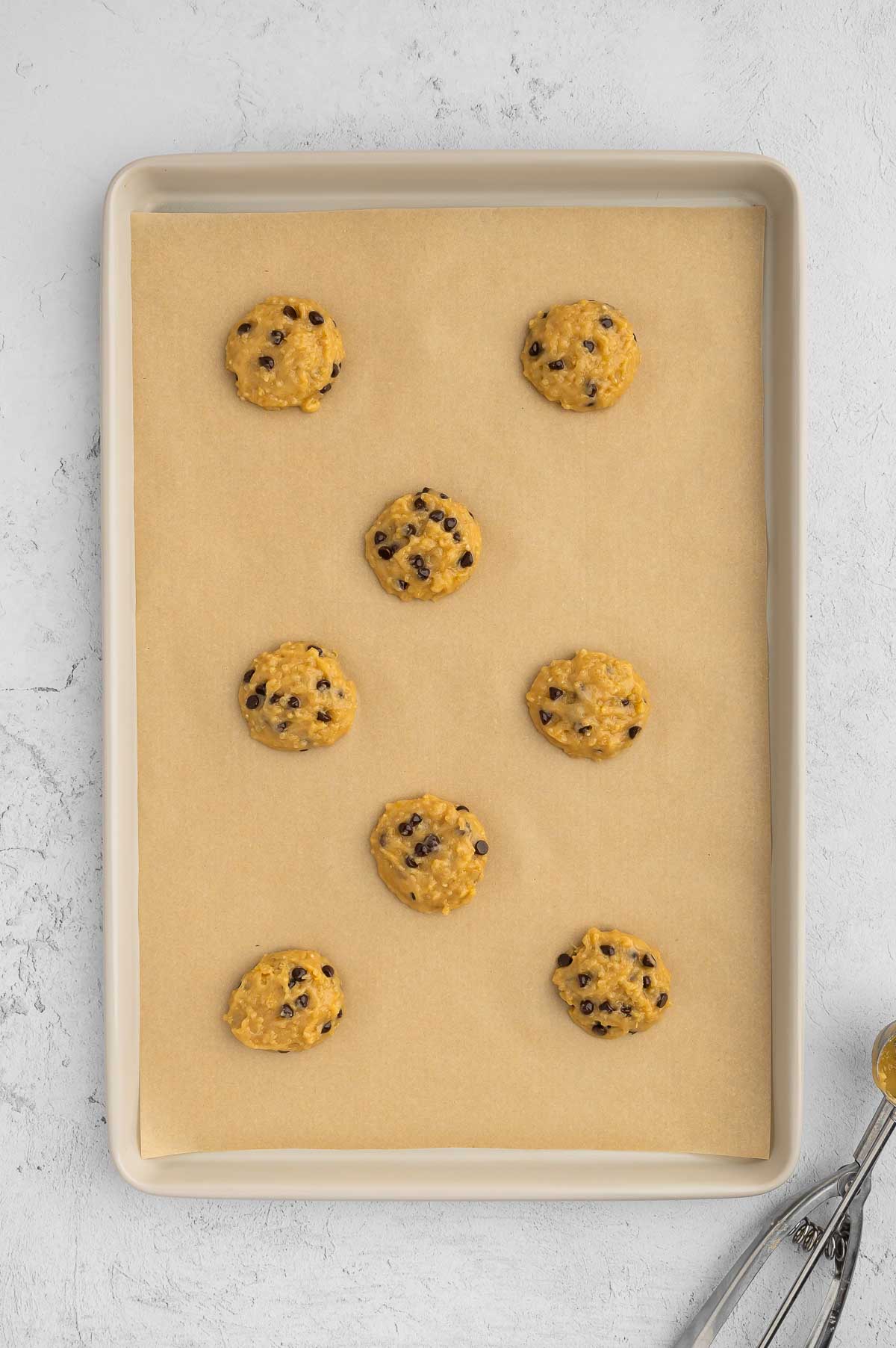 Quinoa cookies on a baking sheet.