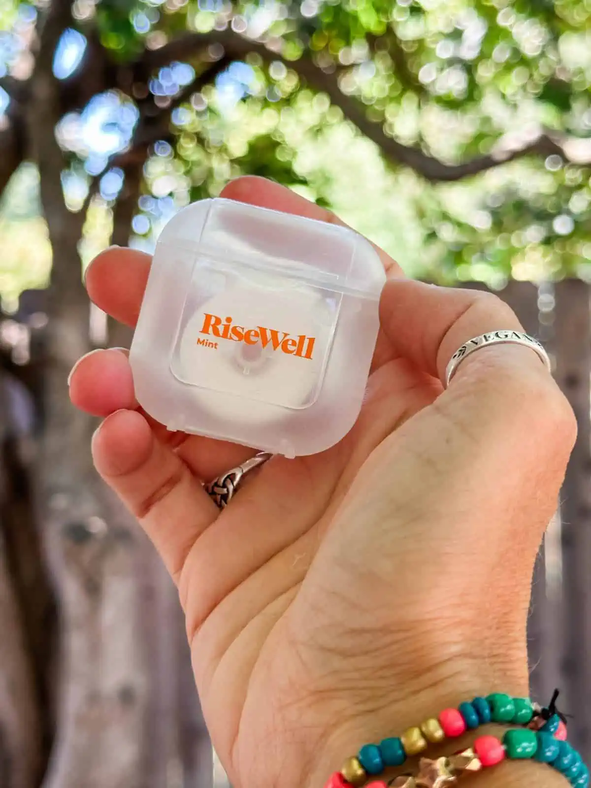 Plastic container of vegan floss from Risewell brand.