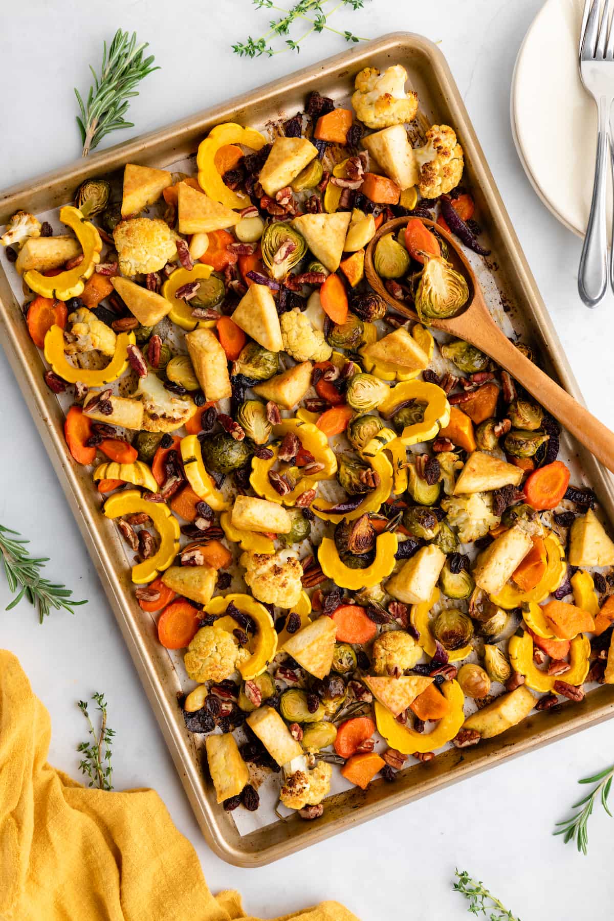 A tray of roasted tofu and sheet pan veggies.