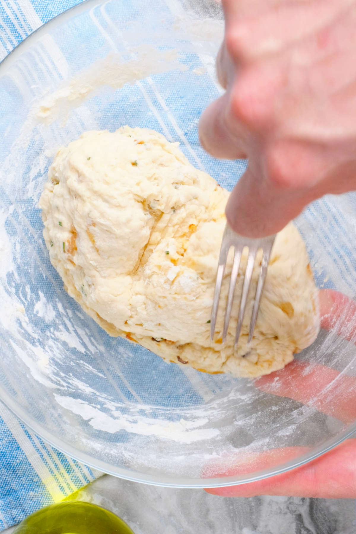 The batter for the rosemary beer bread all mixed together in a mixing bowl.