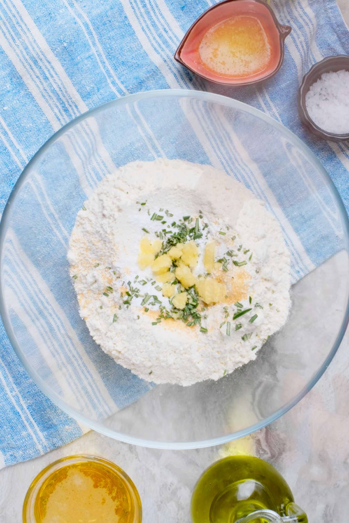 Ingredients for the rosemary beer bread in a mixing bowl.