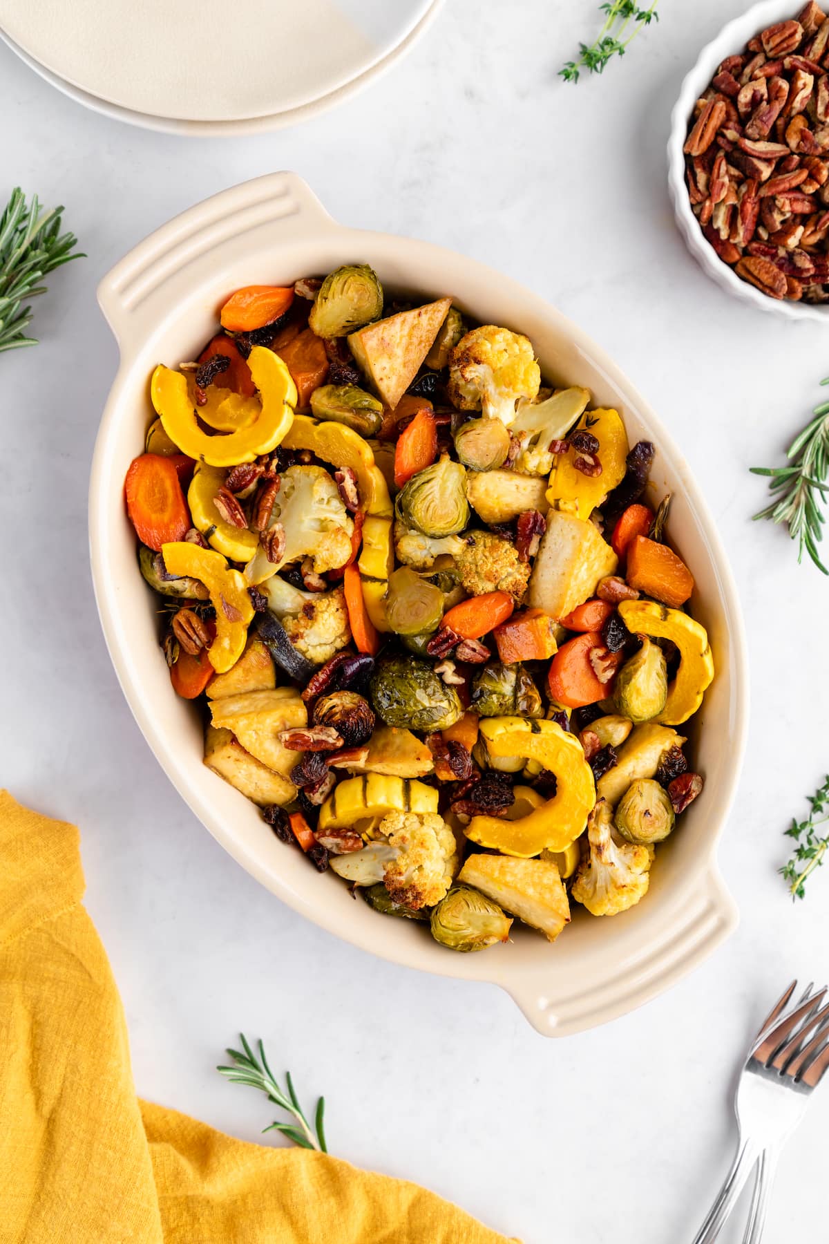 Sheet pan tofu and veggies served in a casserole dish.