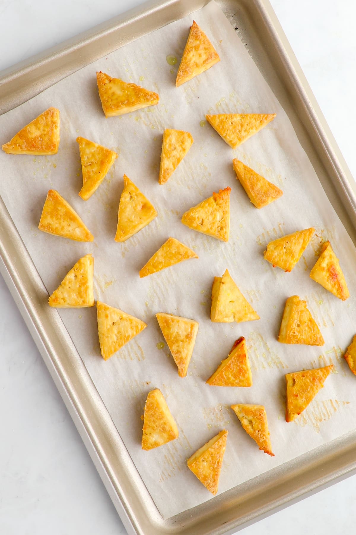 Baked sheet pan tofu on a baking tray.