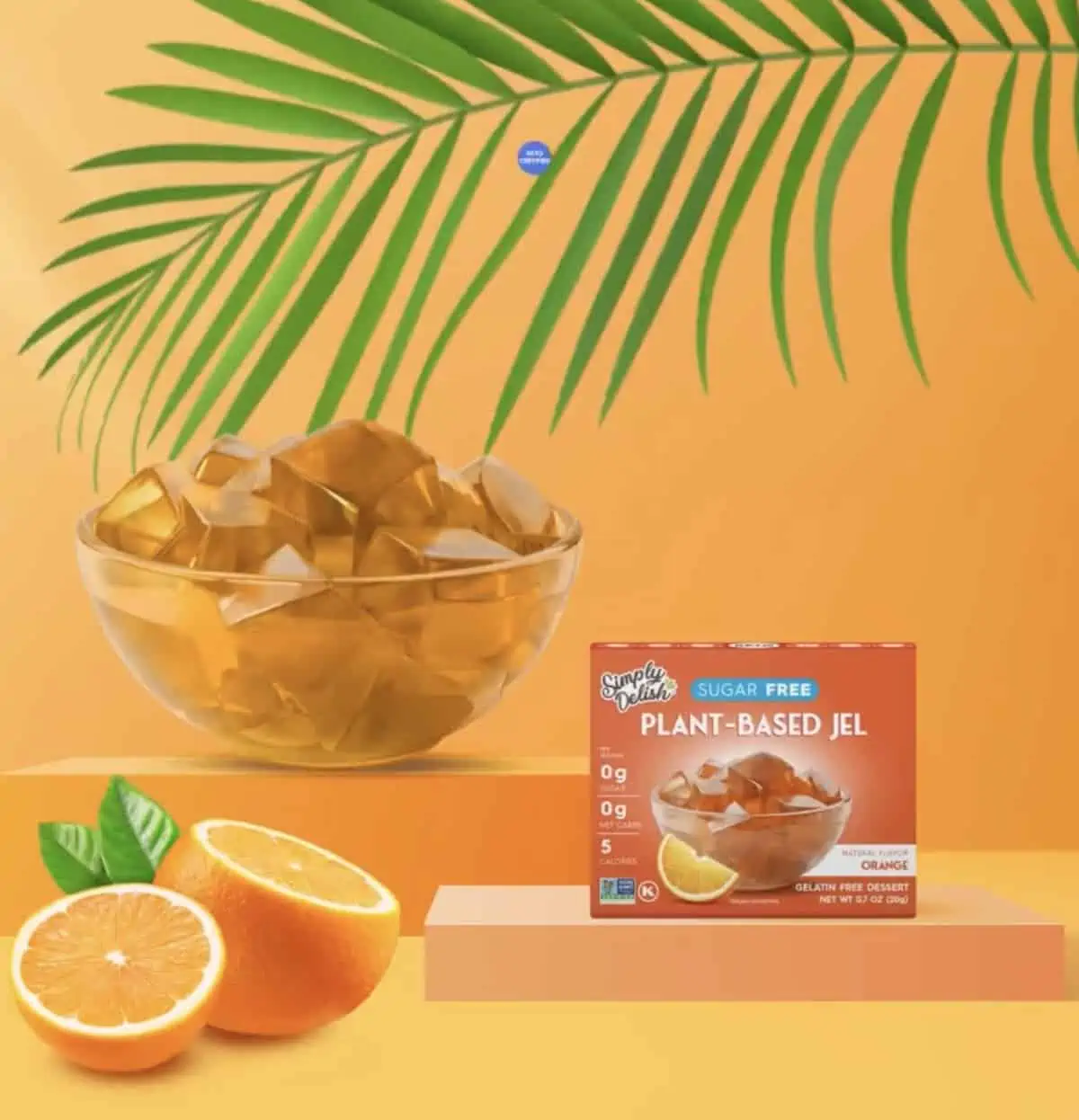 Box of Simply Delish brand plant based vegan jello mix in tropical setting.