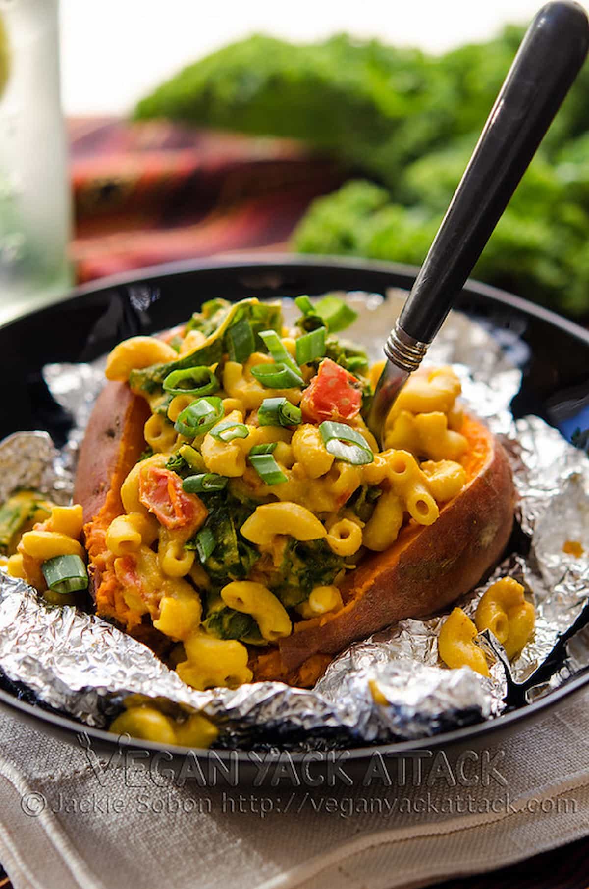 Sweet potatoes stuffed with vegan mac and cheese.