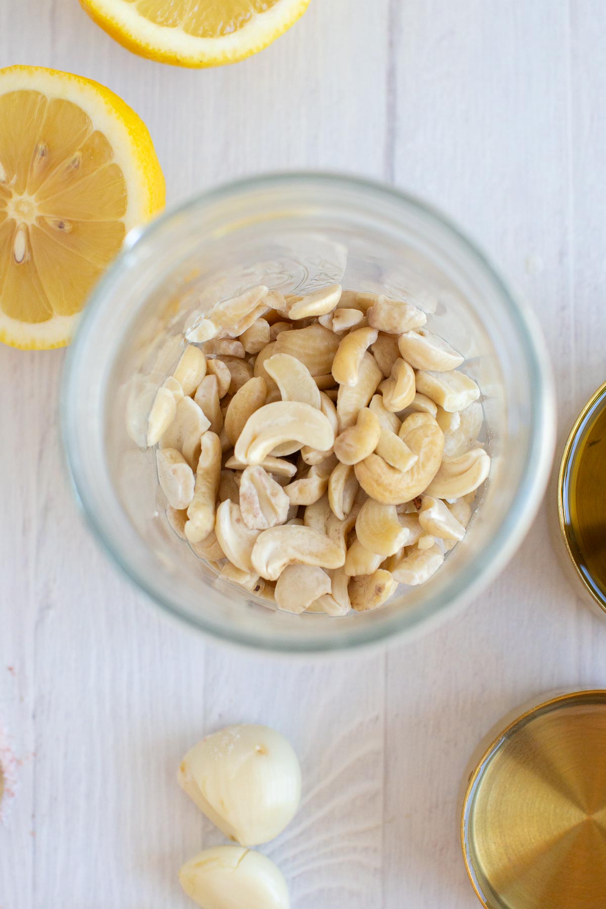 Soaked cashews in a glass jar.