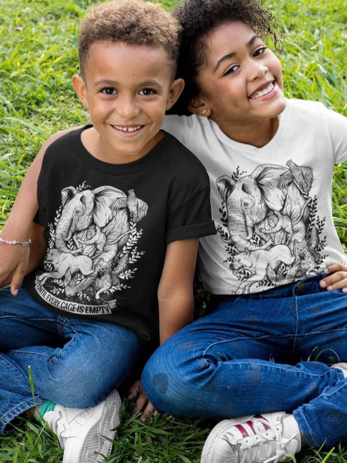 Two friendly children wearing vegan kids shirts with an animal rights message from Vegan Veins.