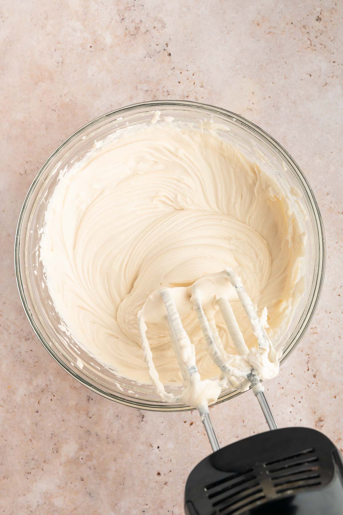 The cornstarch slurry added to the vegan cream cheese mixture and whipped again using an electric hand mixer.