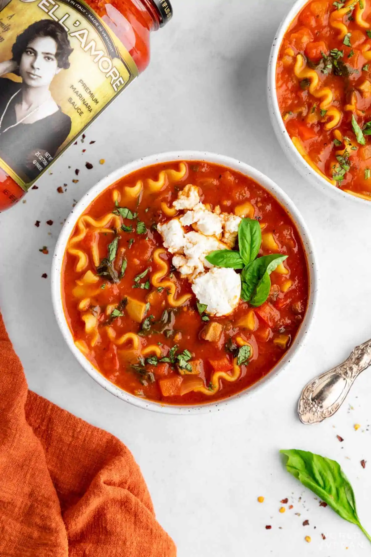 Two bowls of how lasagna soup with a flavorful authentic Italian marinara sauce from Dell Amore.