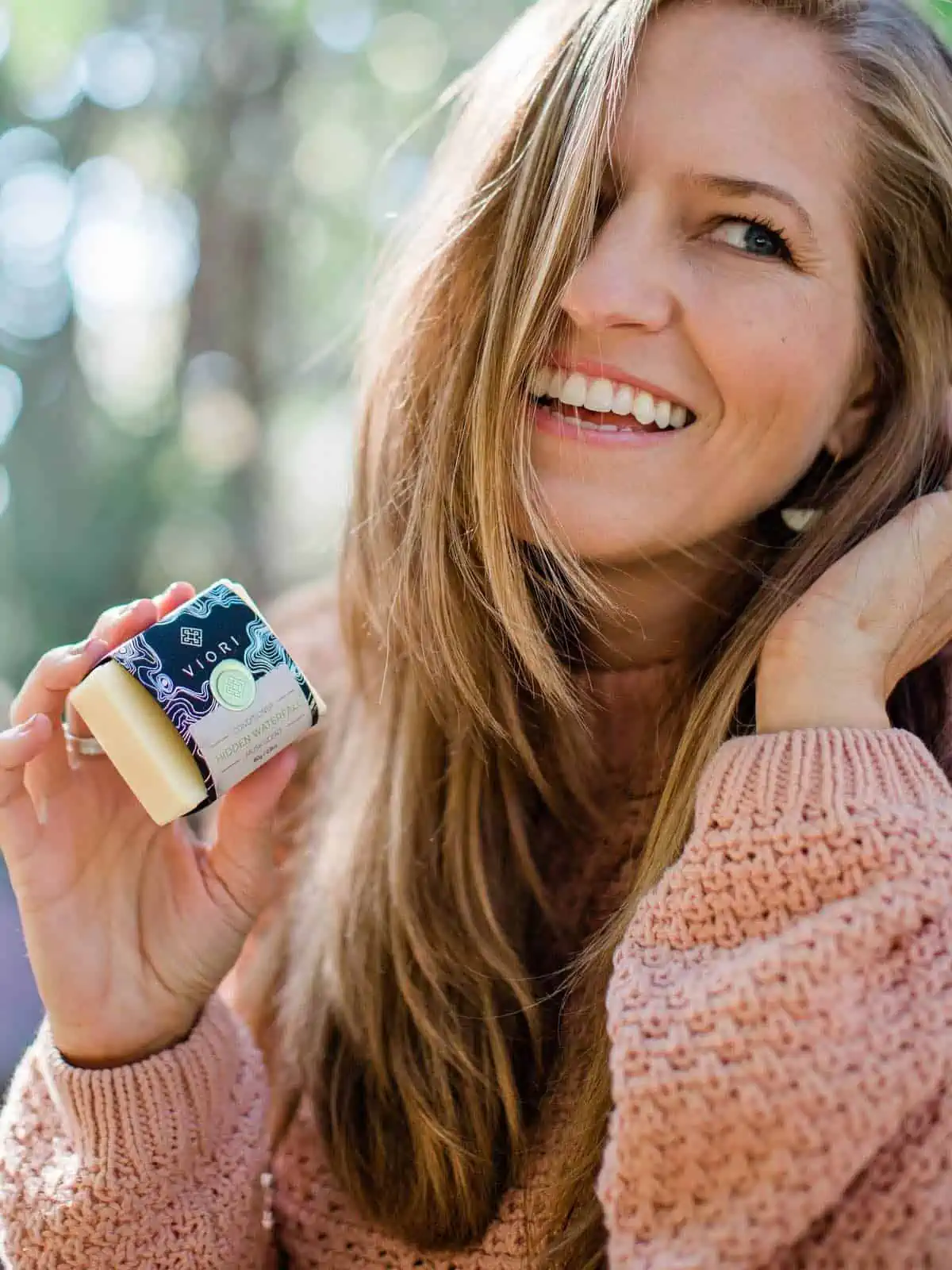 World of Vegan founder Michelle Cehn holding her sustainable conditioner bar.