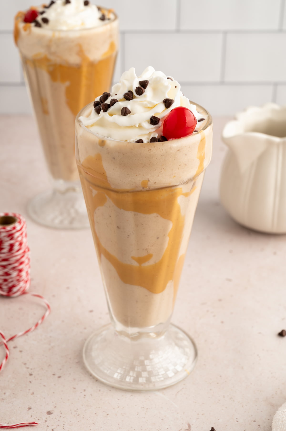 Vegan milkshakes with dairy-free whipped cream.