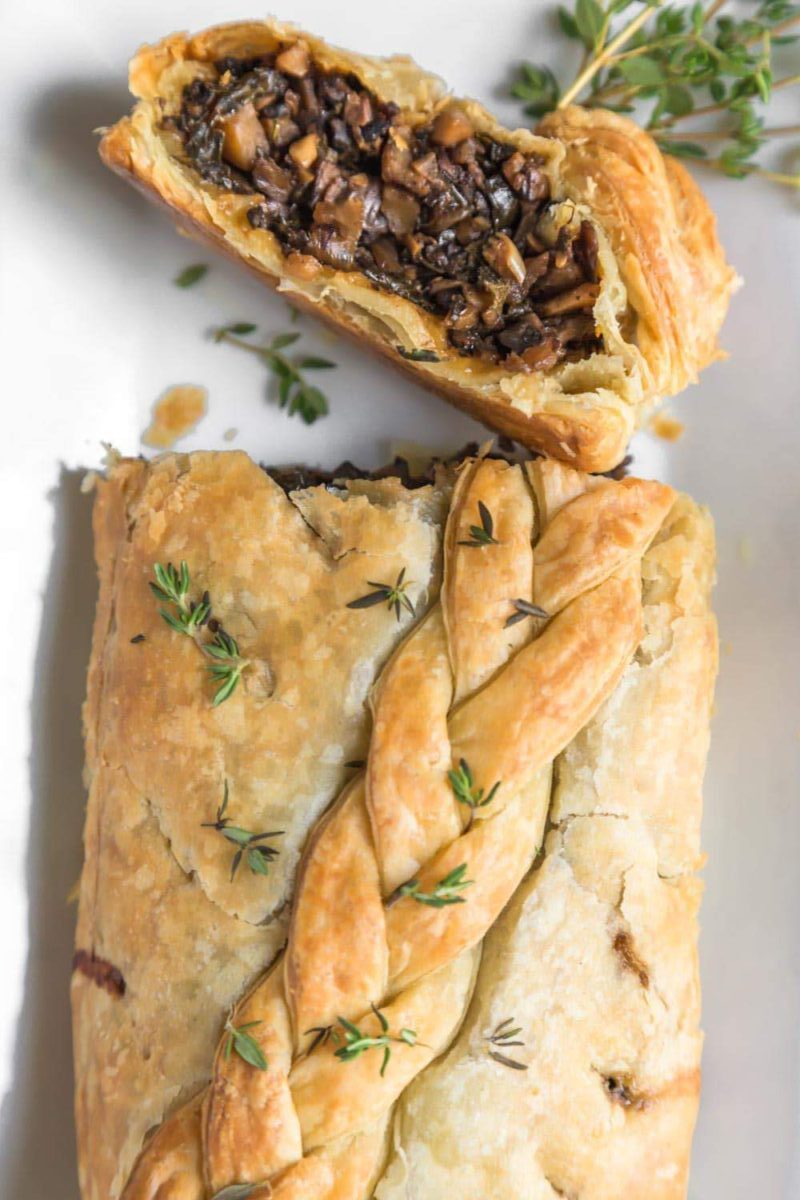A vegan Wellington sliced open to show mushroom filling.
